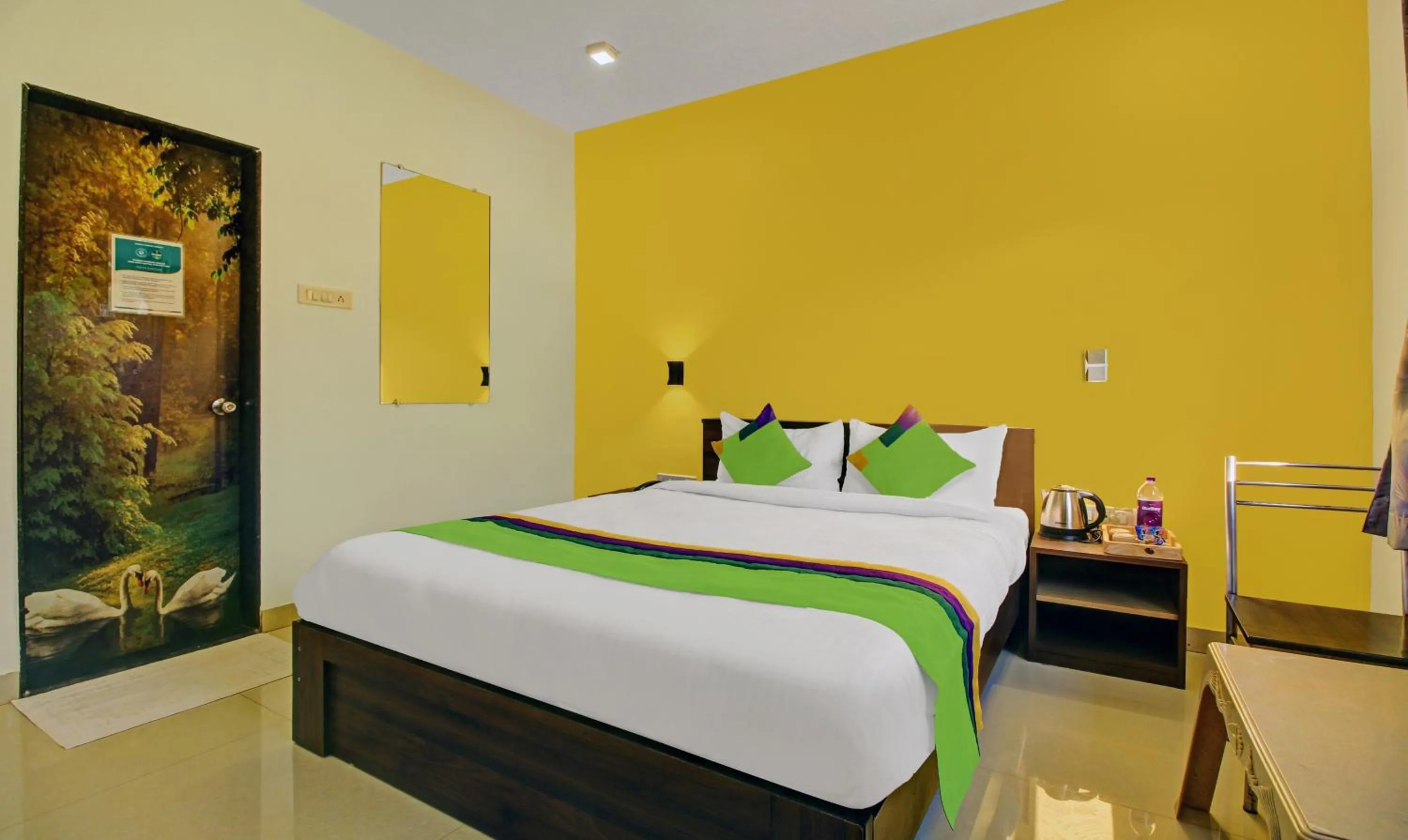 Bedroom, Bed in Treebo La Paradise