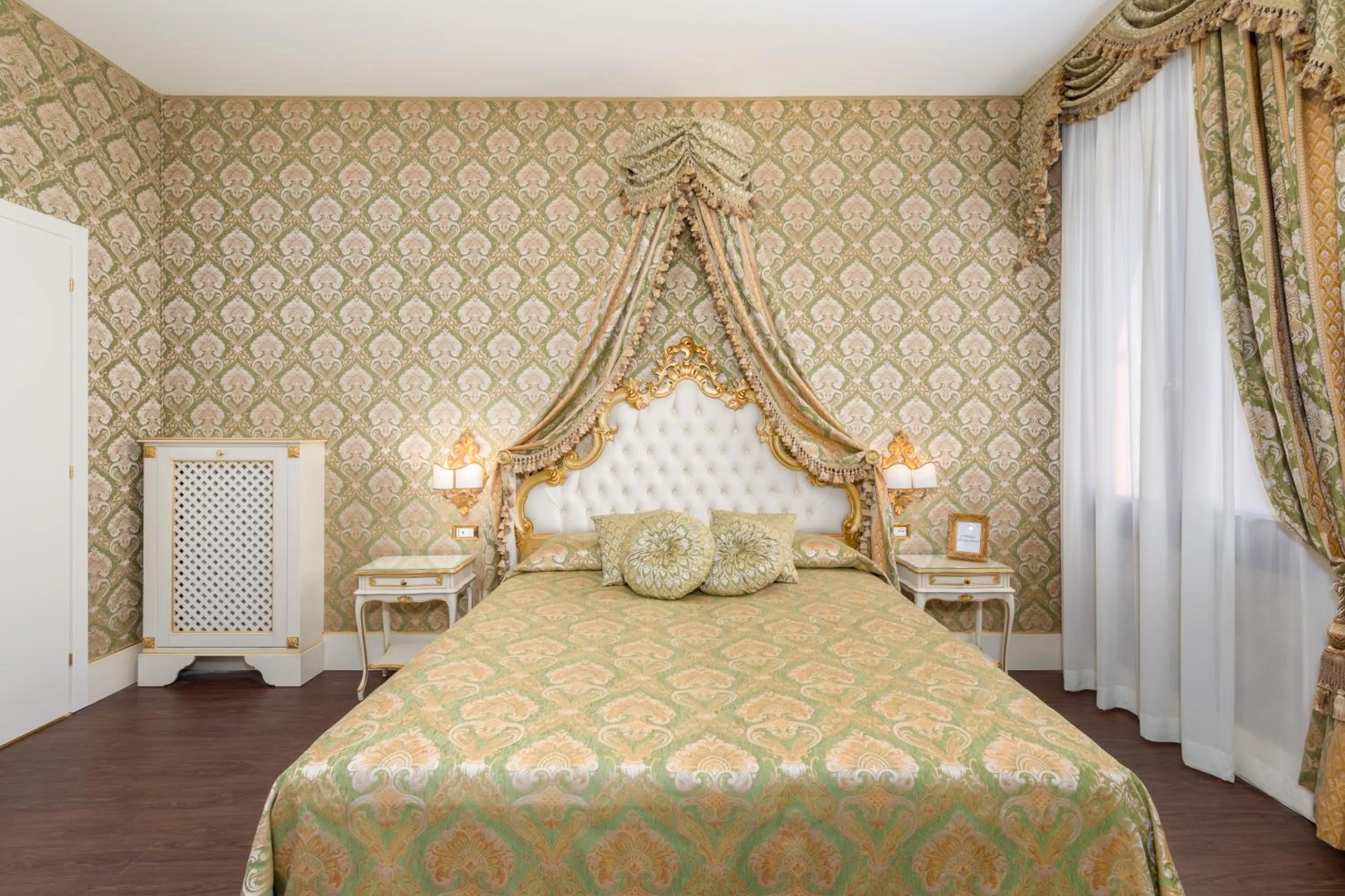 Bed in La Veneziana Boutique Rooms