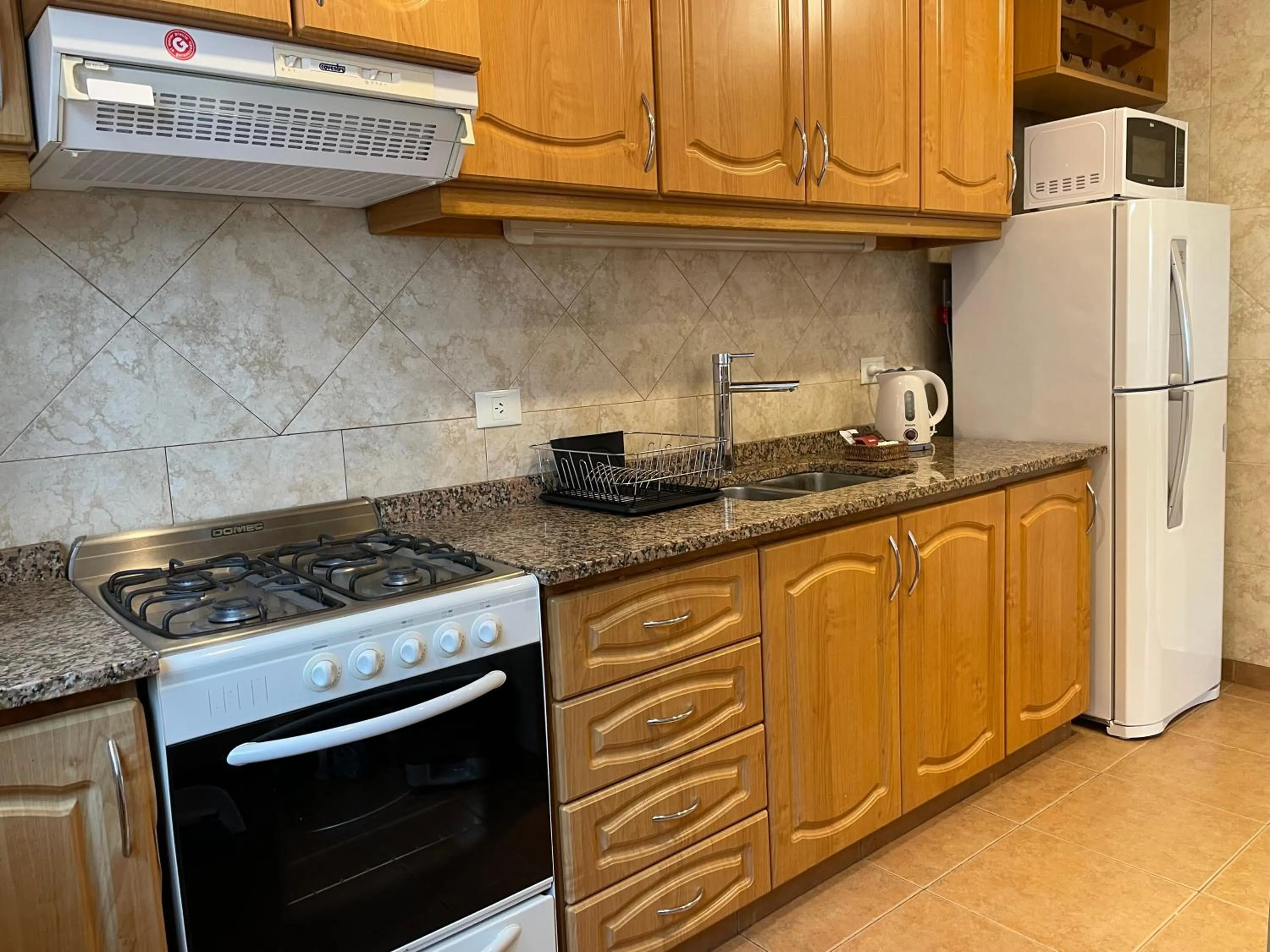 Kitchen or kitchenette in South Apartments