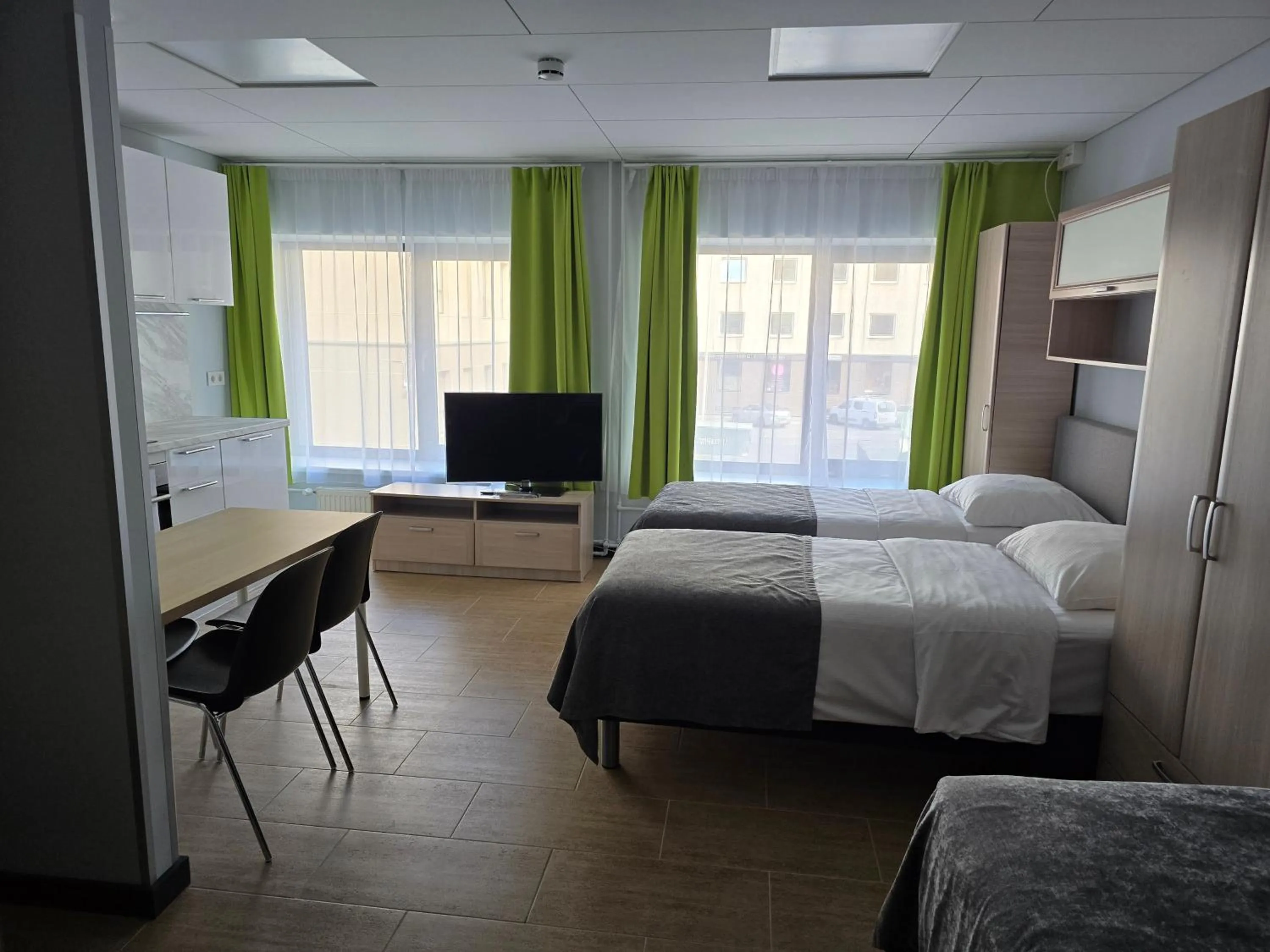 Bed in City Yard Inn Hotel