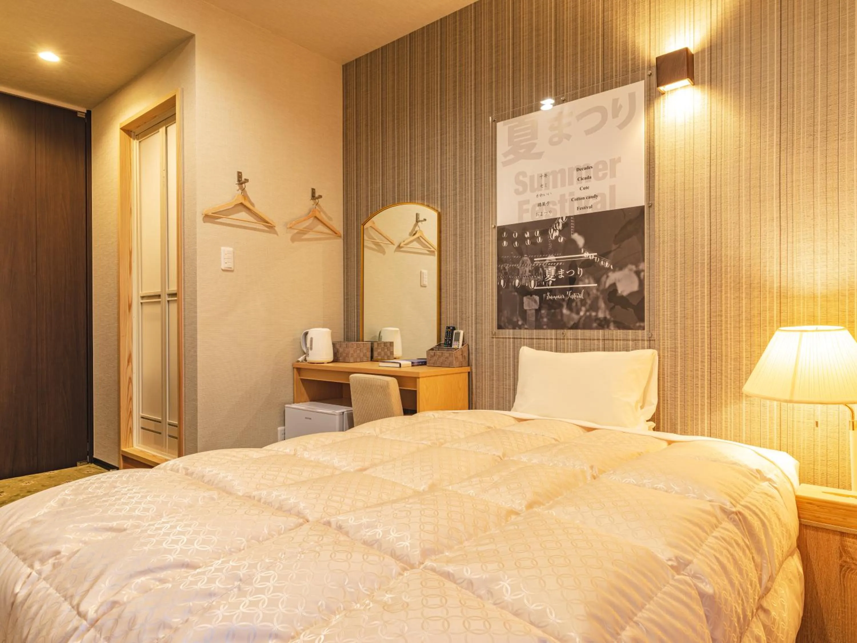 Bed in IBARA DENIM HOTELS 舞鶴楼