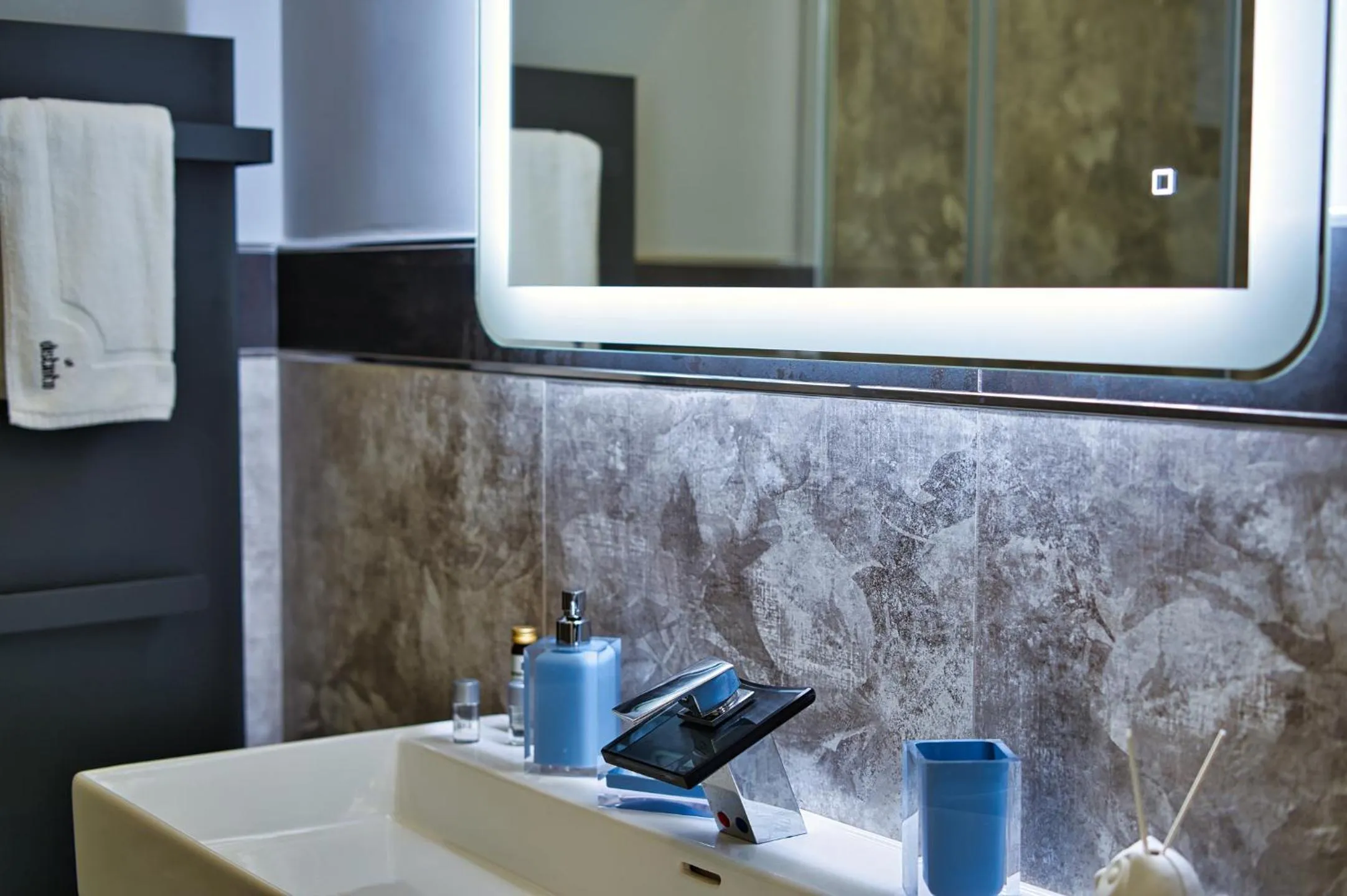 Bathroom in DISTINTO SUITE & ROOMS