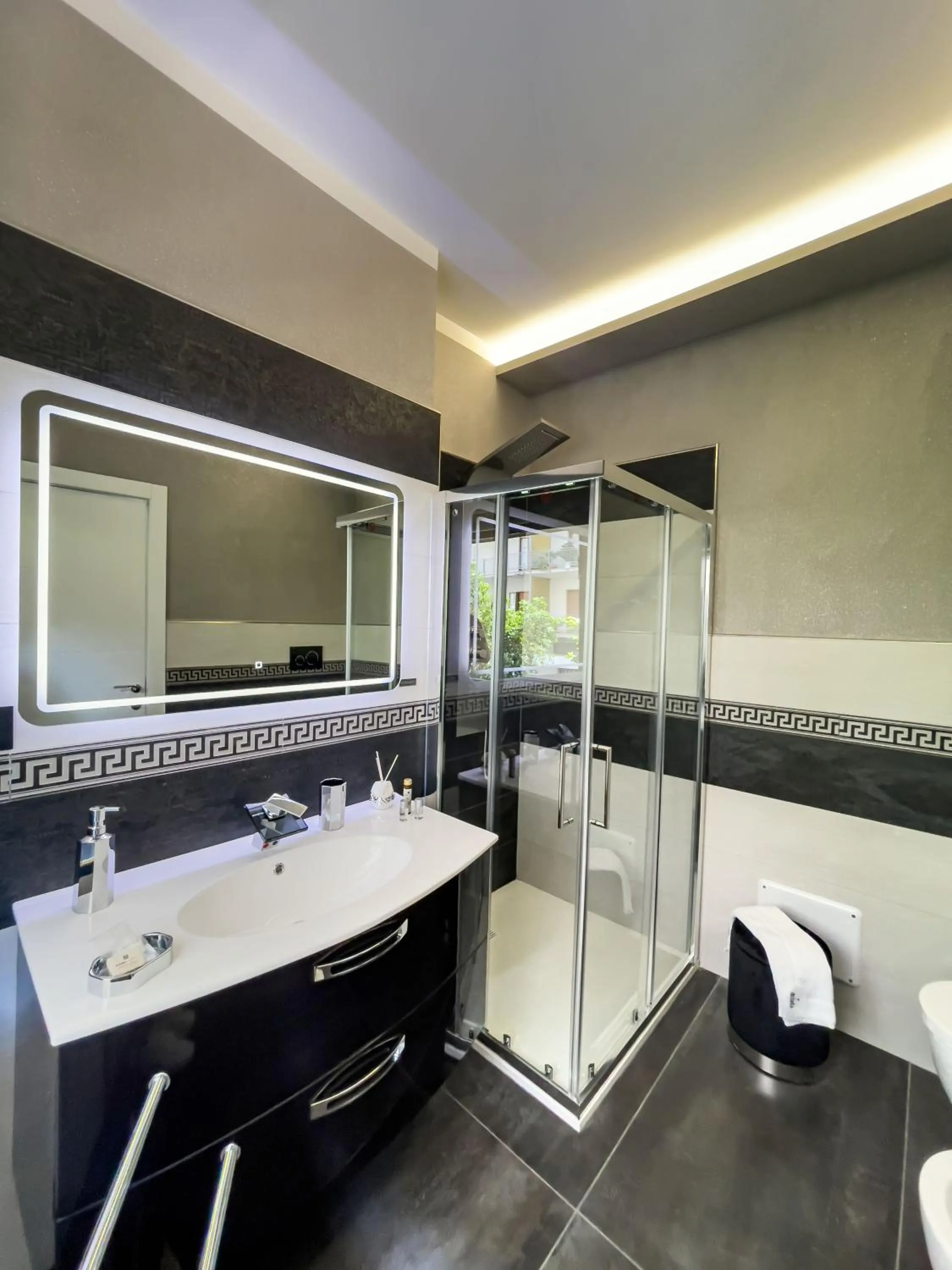 Bathroom in DISTINTO SUITE & ROOMS
