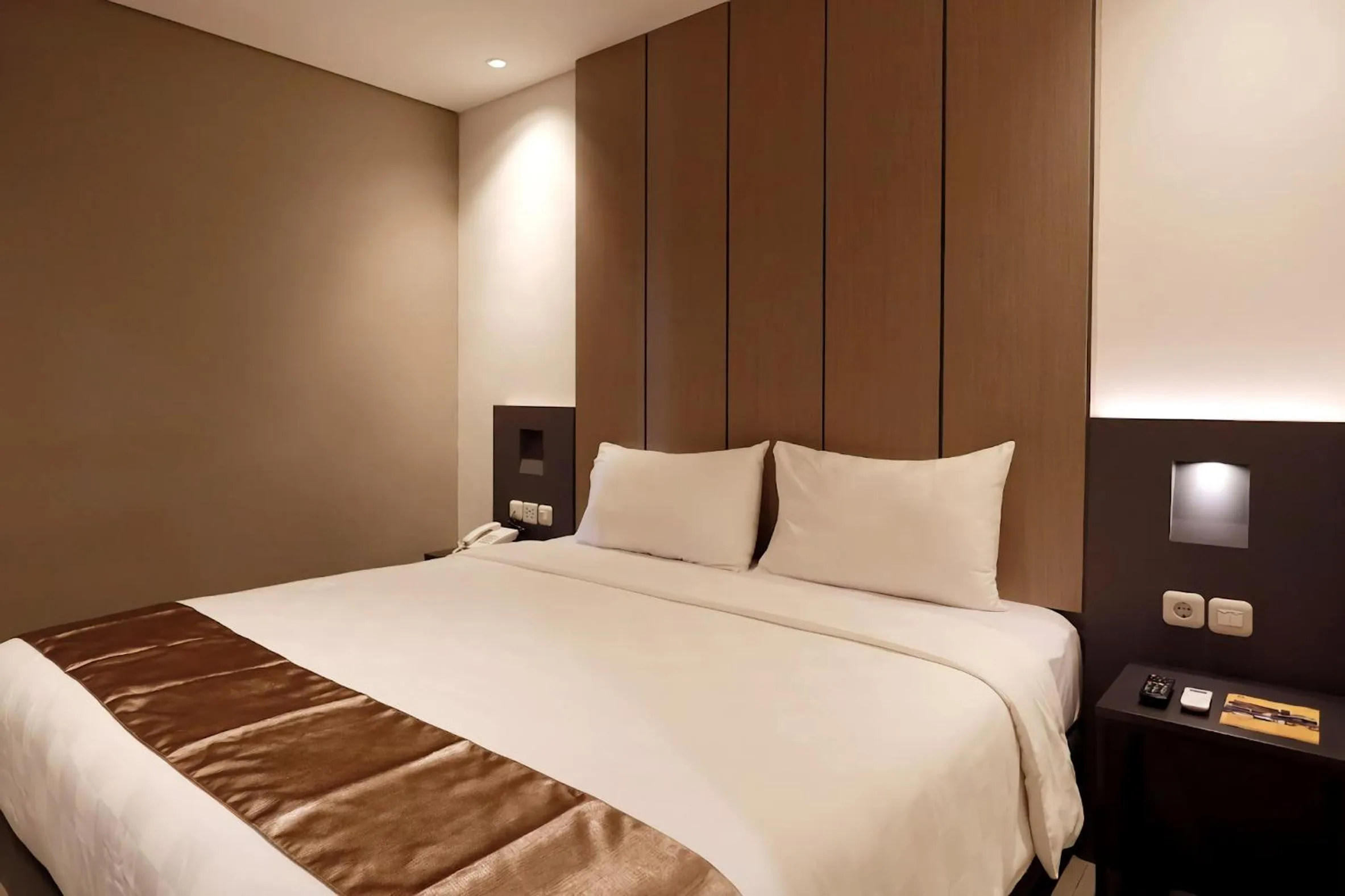 Property building, Bed in Hayo Hotel Palembang