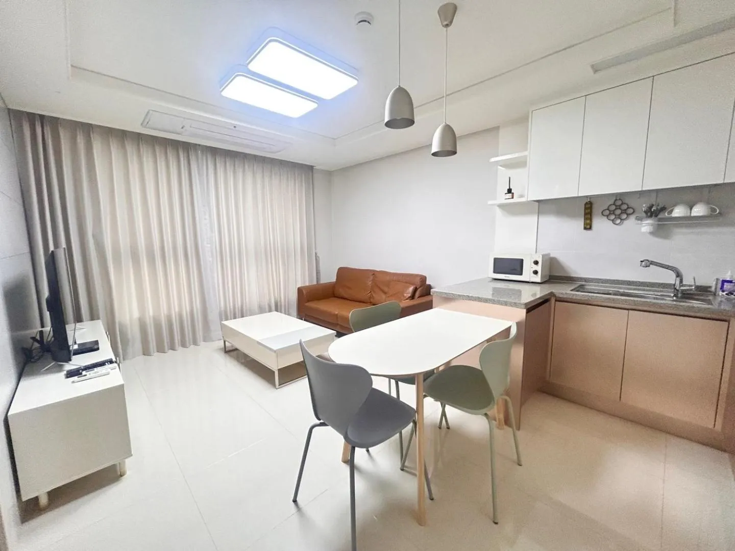 Kitchen or kitchenette in Landmark Stay in Songdo