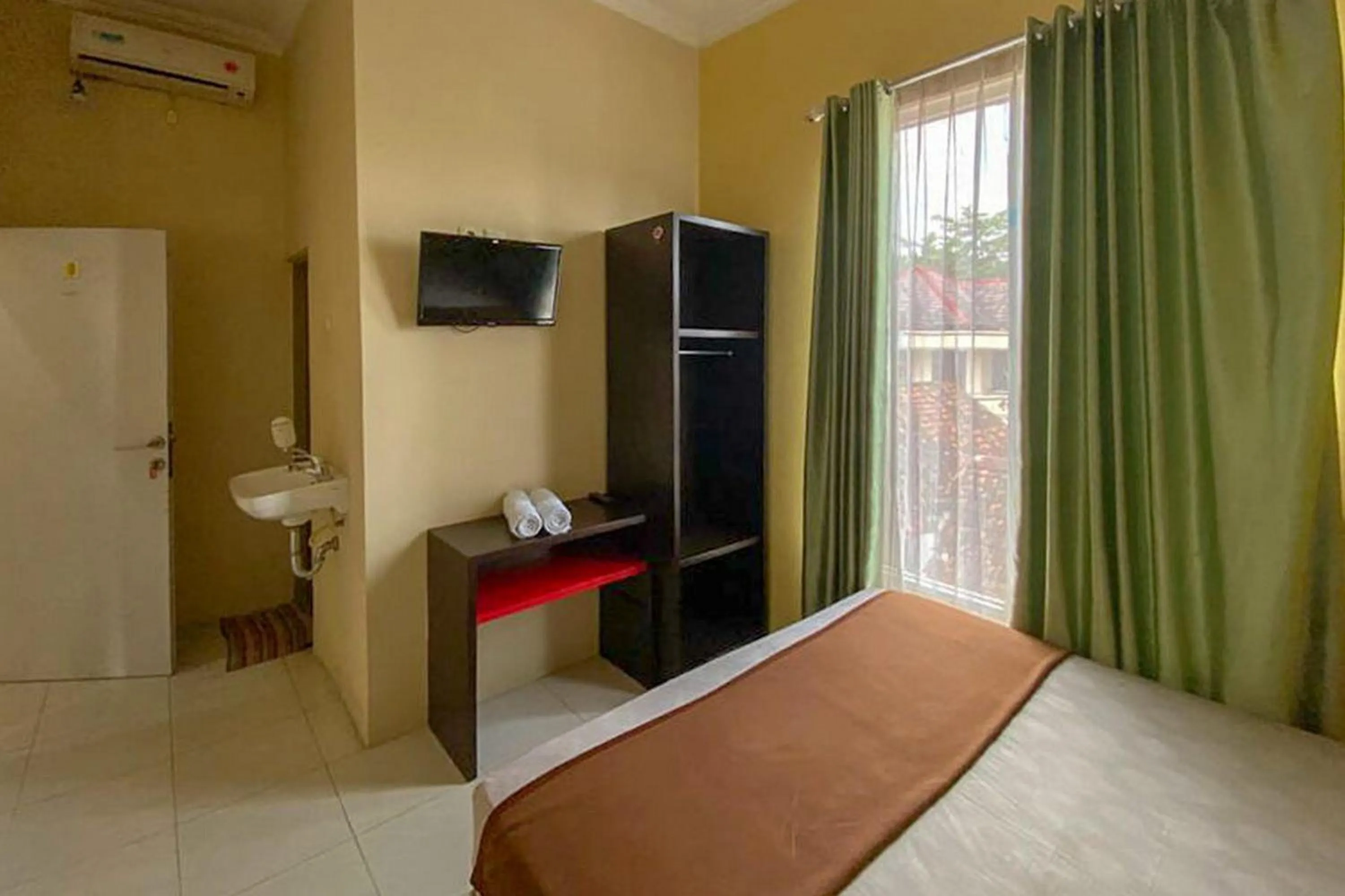 Bed in Rama Shinta Homestay near Gembira Loka Zoo RedPartner