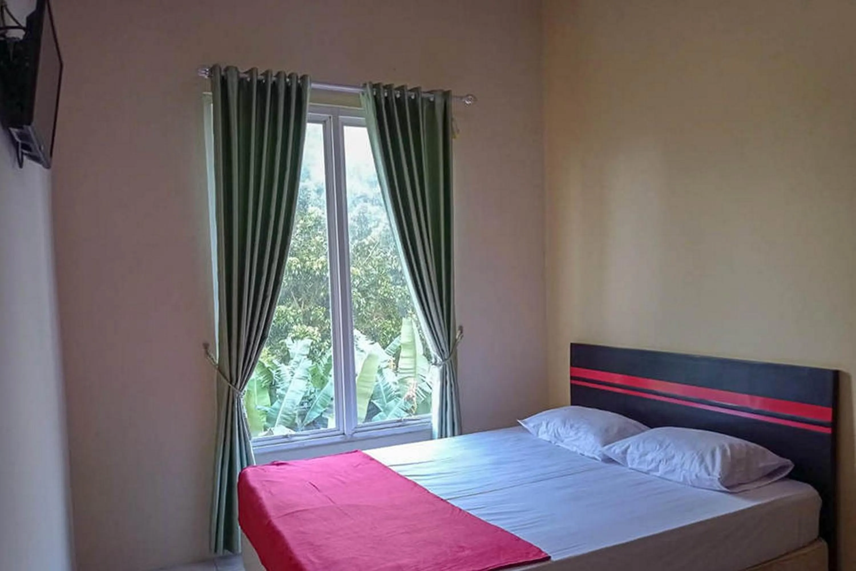 Bed in Rama Shinta Homestay near Gembira Loka Zoo RedPartner