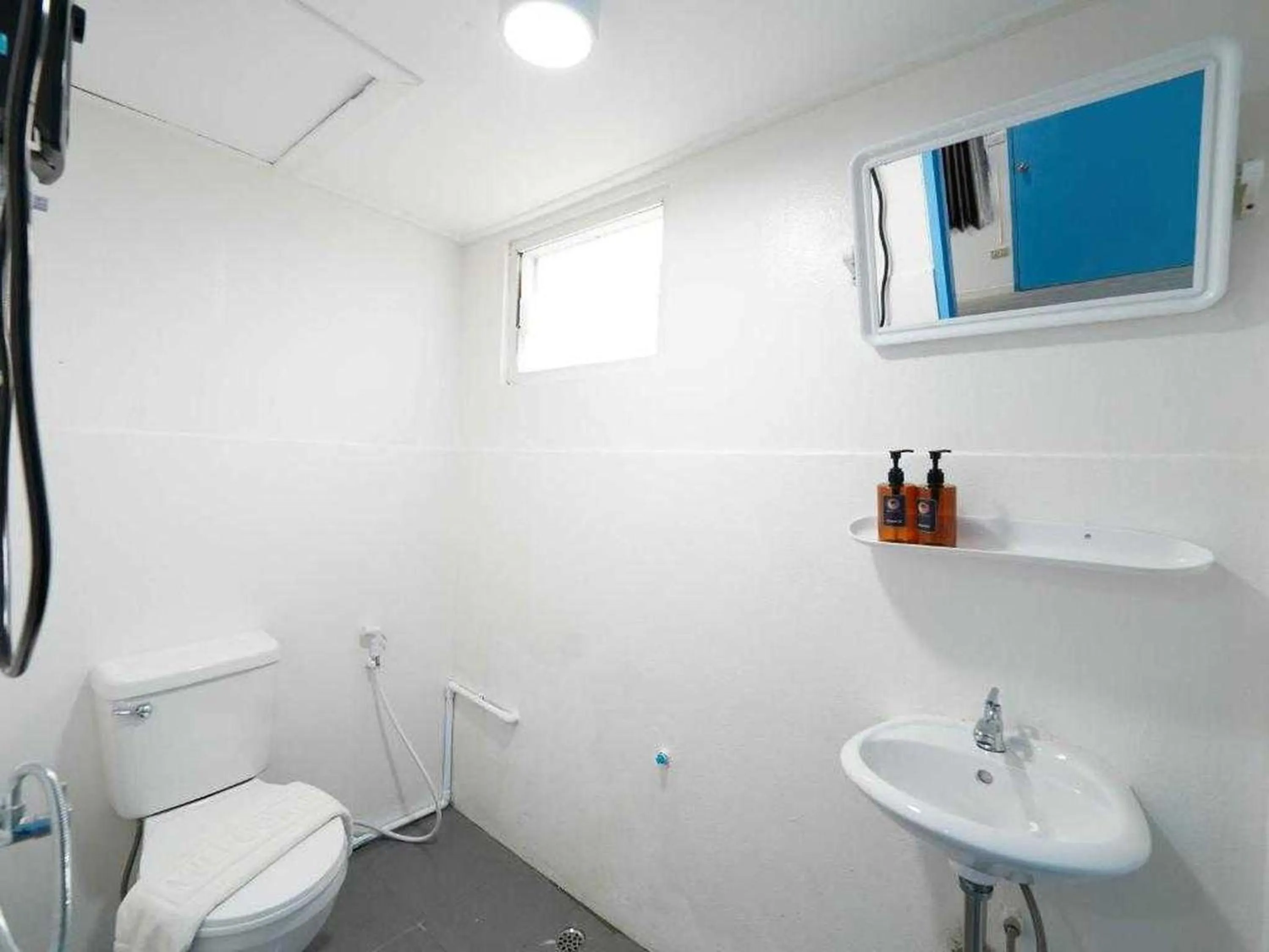 Bathroom in RQ North Pattaya by Collection O