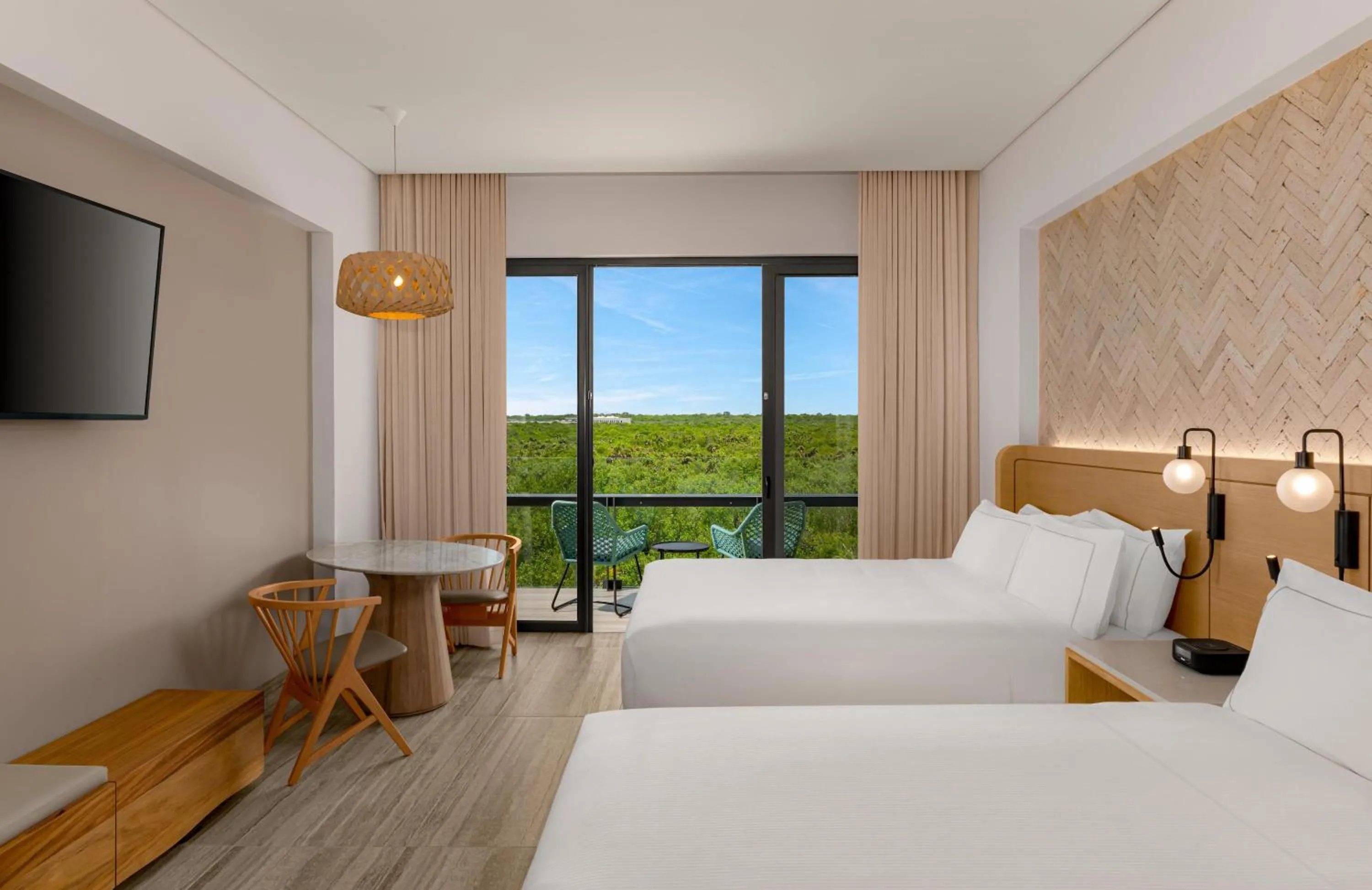 Bed in Hilton Tulum Riviera Maya All-Inclusive Resort