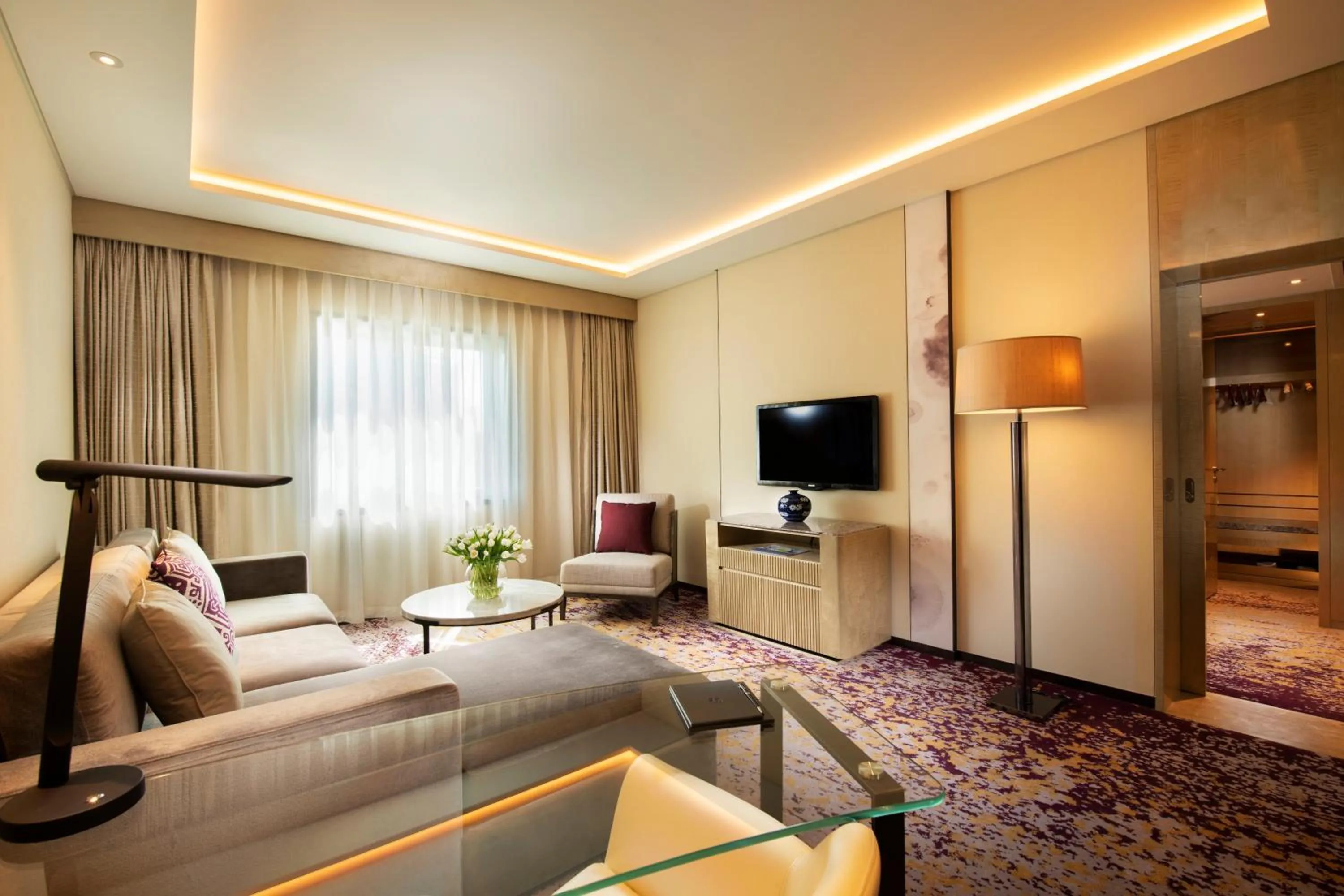 Living room, Bed in Kempinski Hotel Beijing Yansha Center