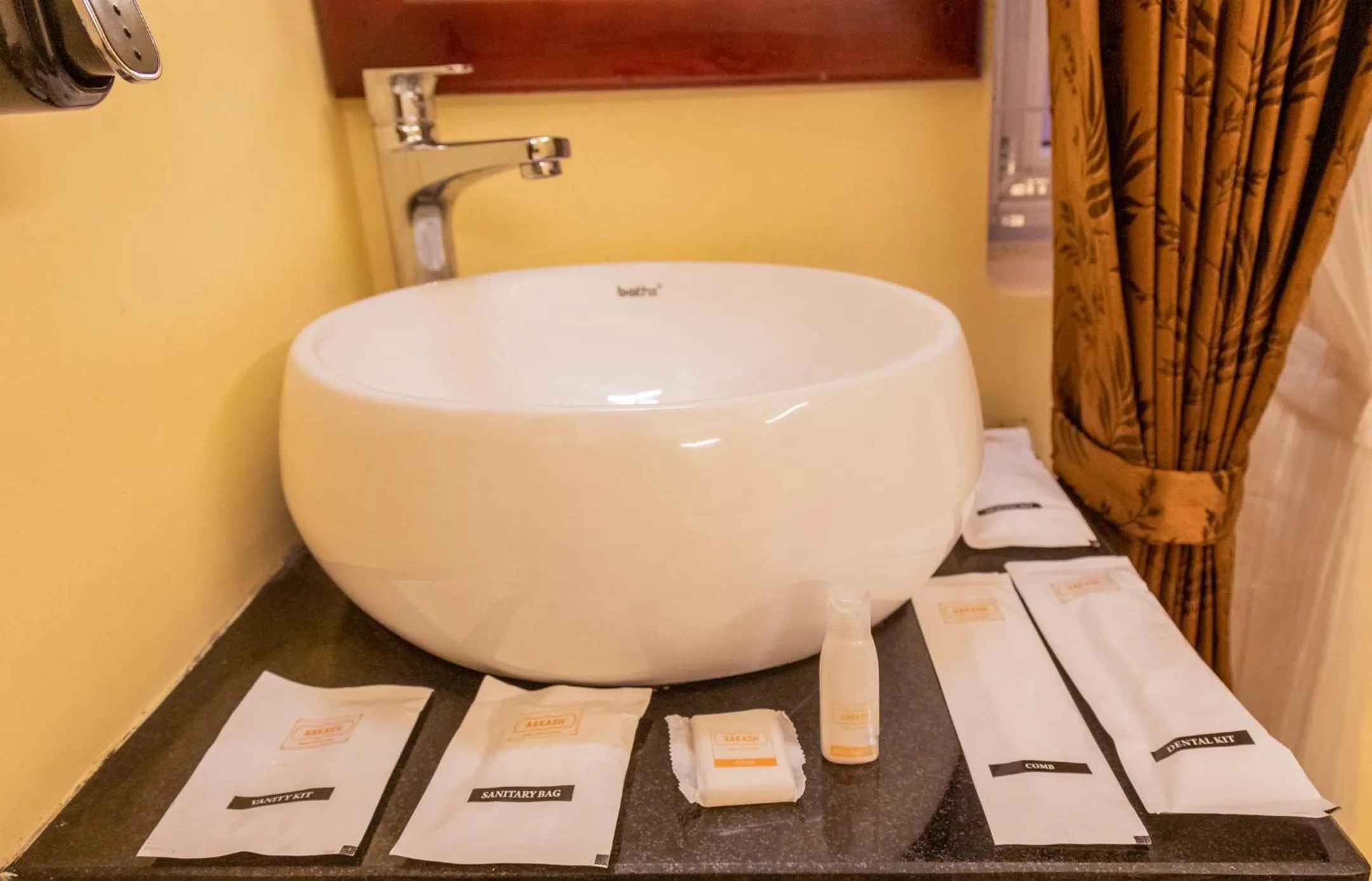 Bathroom in Aakash Rooms and Cottages,