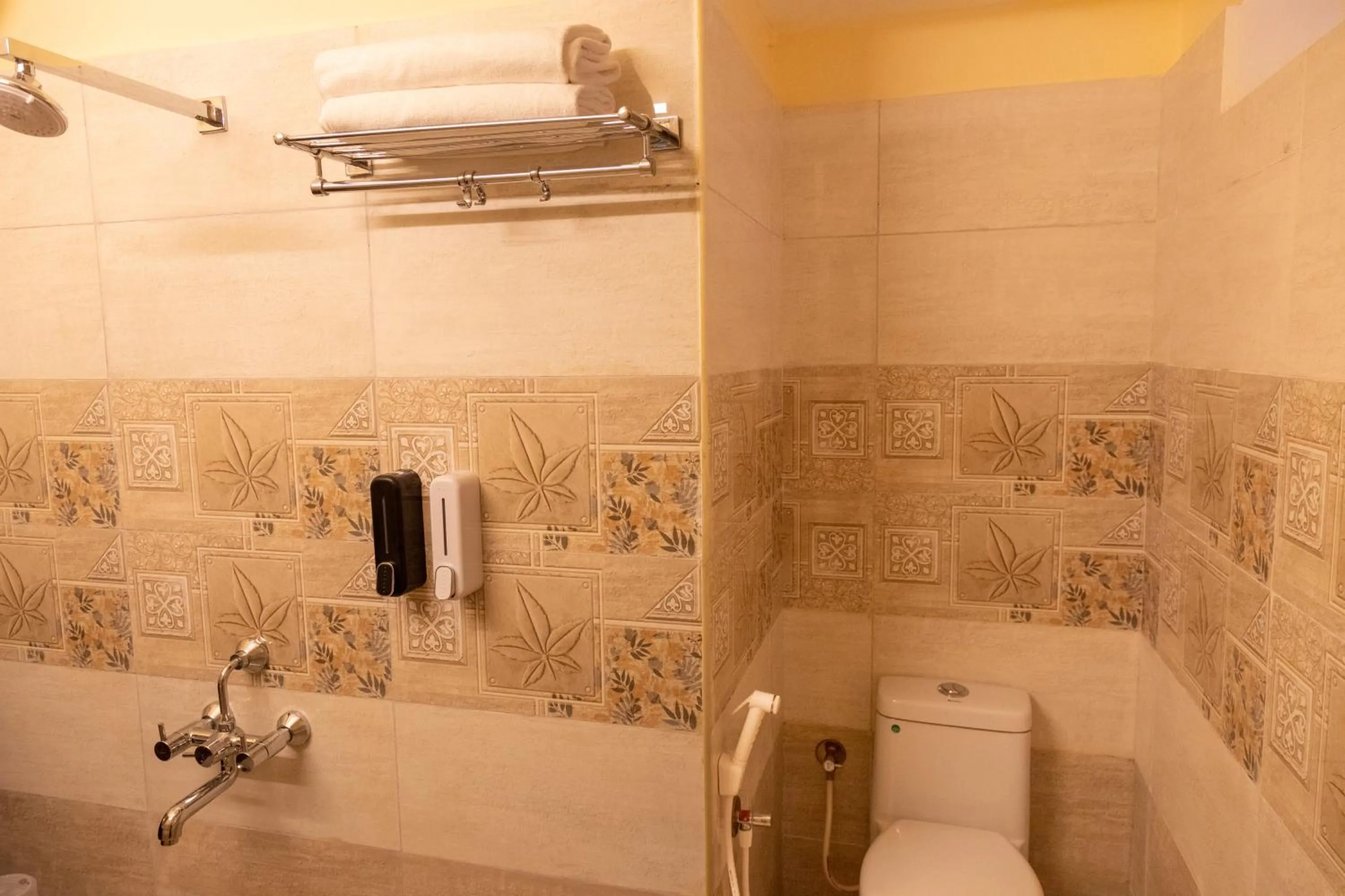 Bathroom in Aakash Rooms and Cottages,