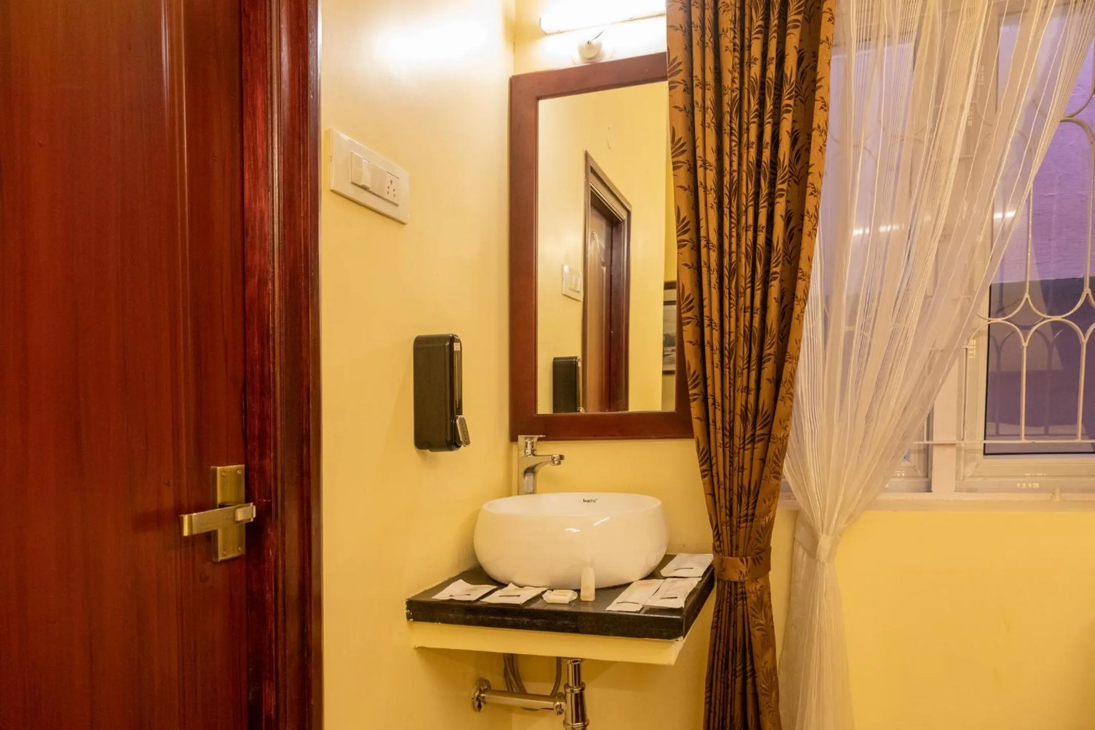Bathroom in Aakash Rooms and Cottages,