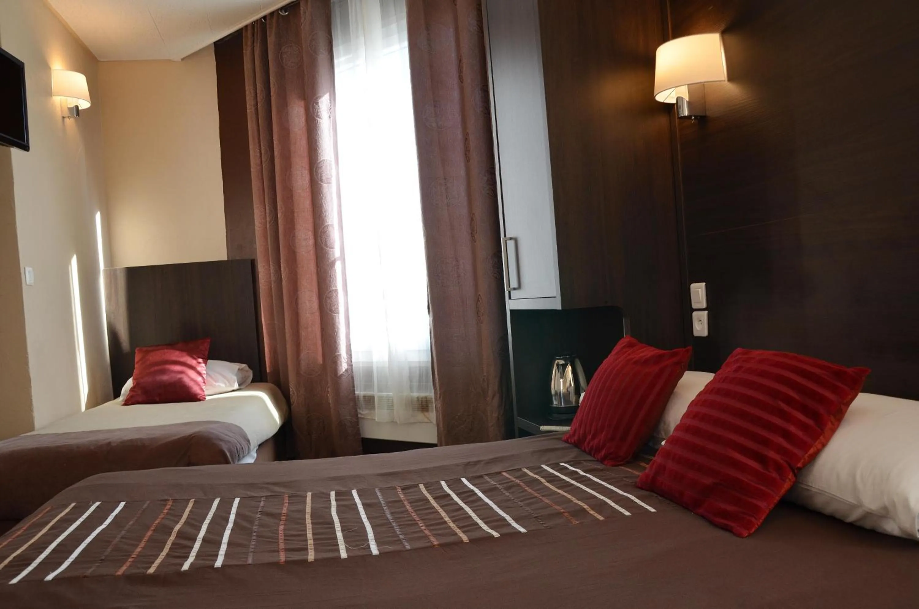 Bed in Hôtel du Parc