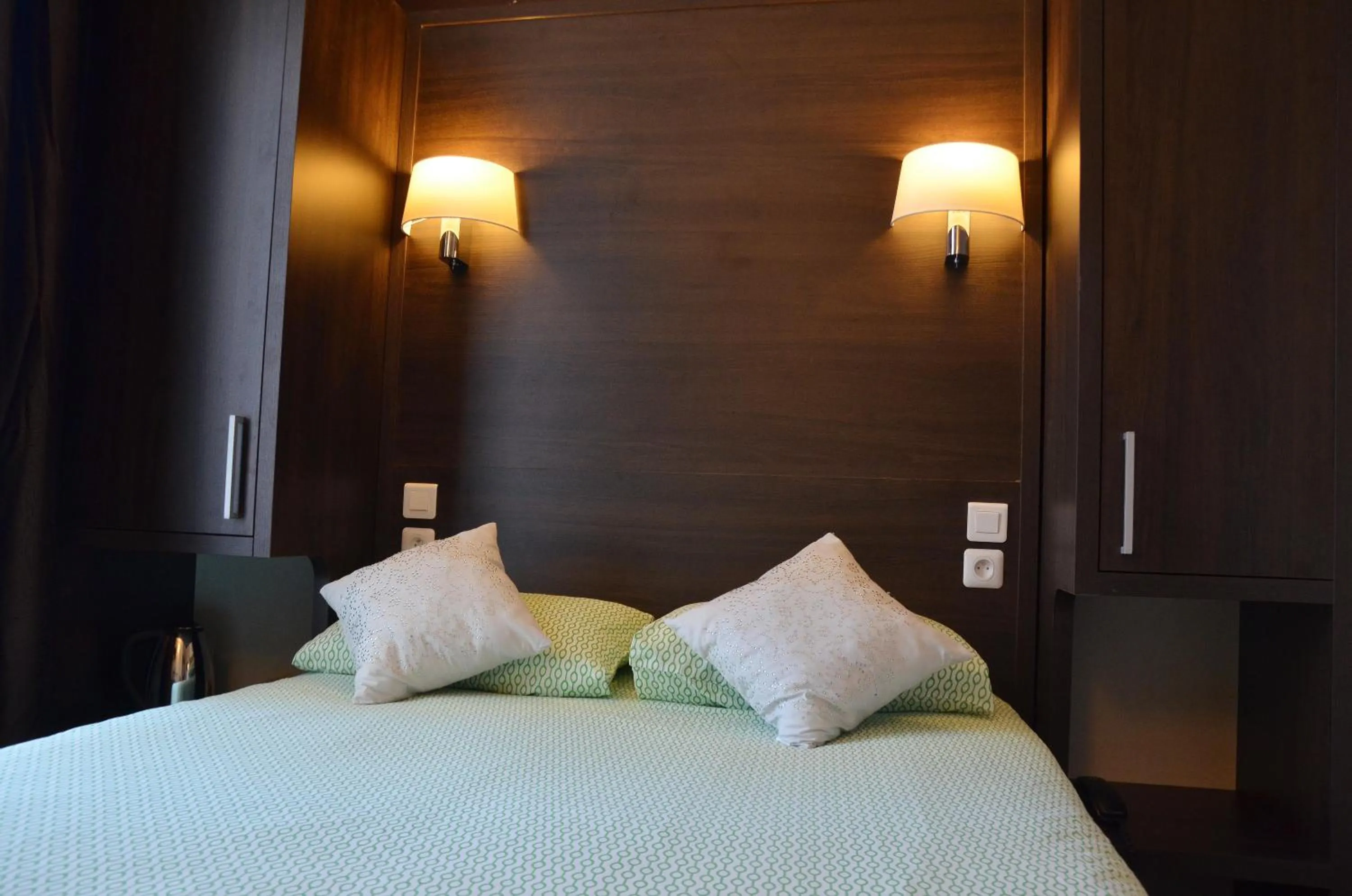 Bed in Hôtel du Parc