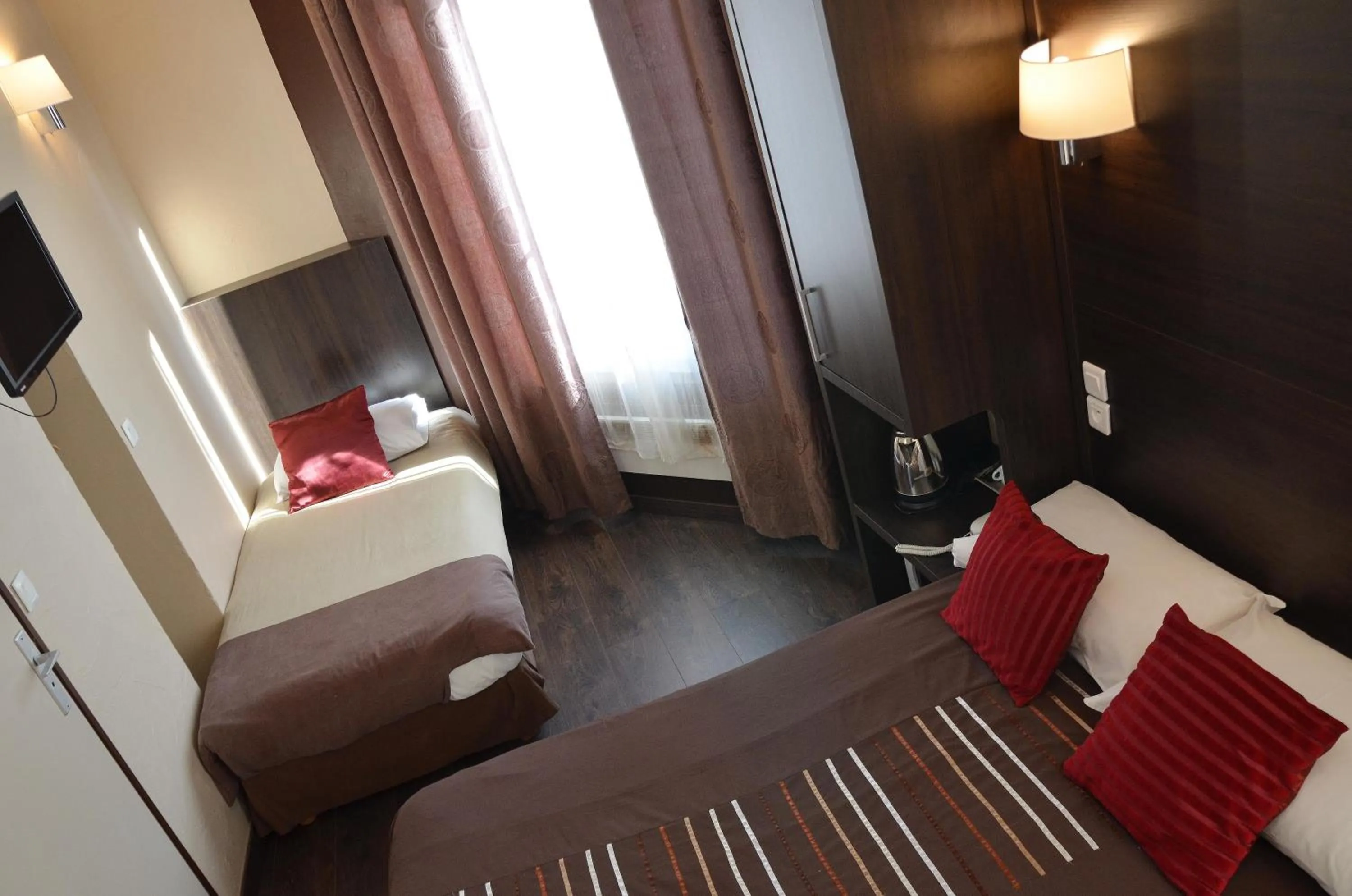 Bed in Hôtel du Parc