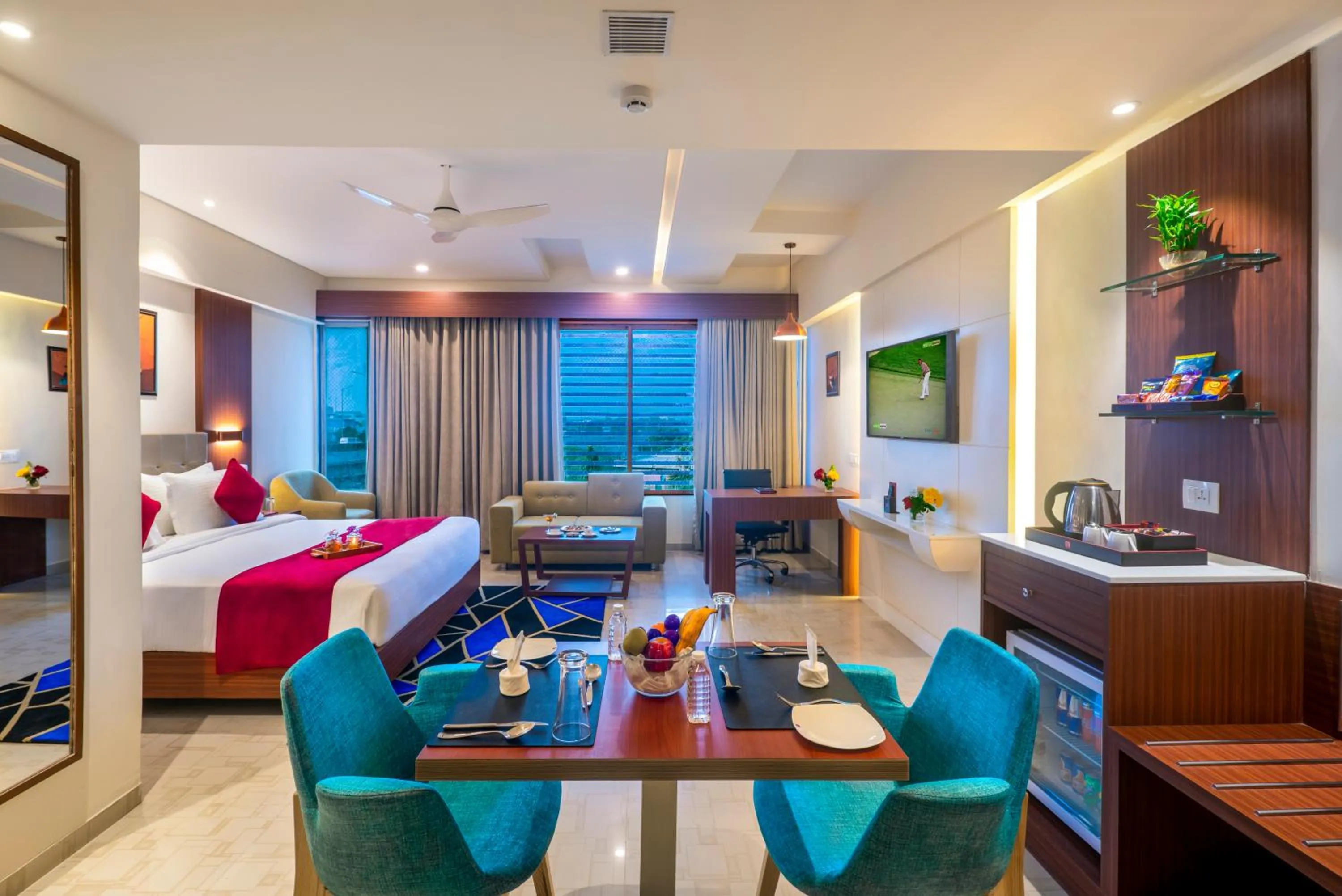 Seating area, Bed in Lords Eco Inn Shapar Rajkot