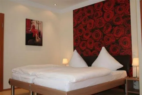 Photo of the whole room, Bed in Gasthof Wimmer Weissbräu