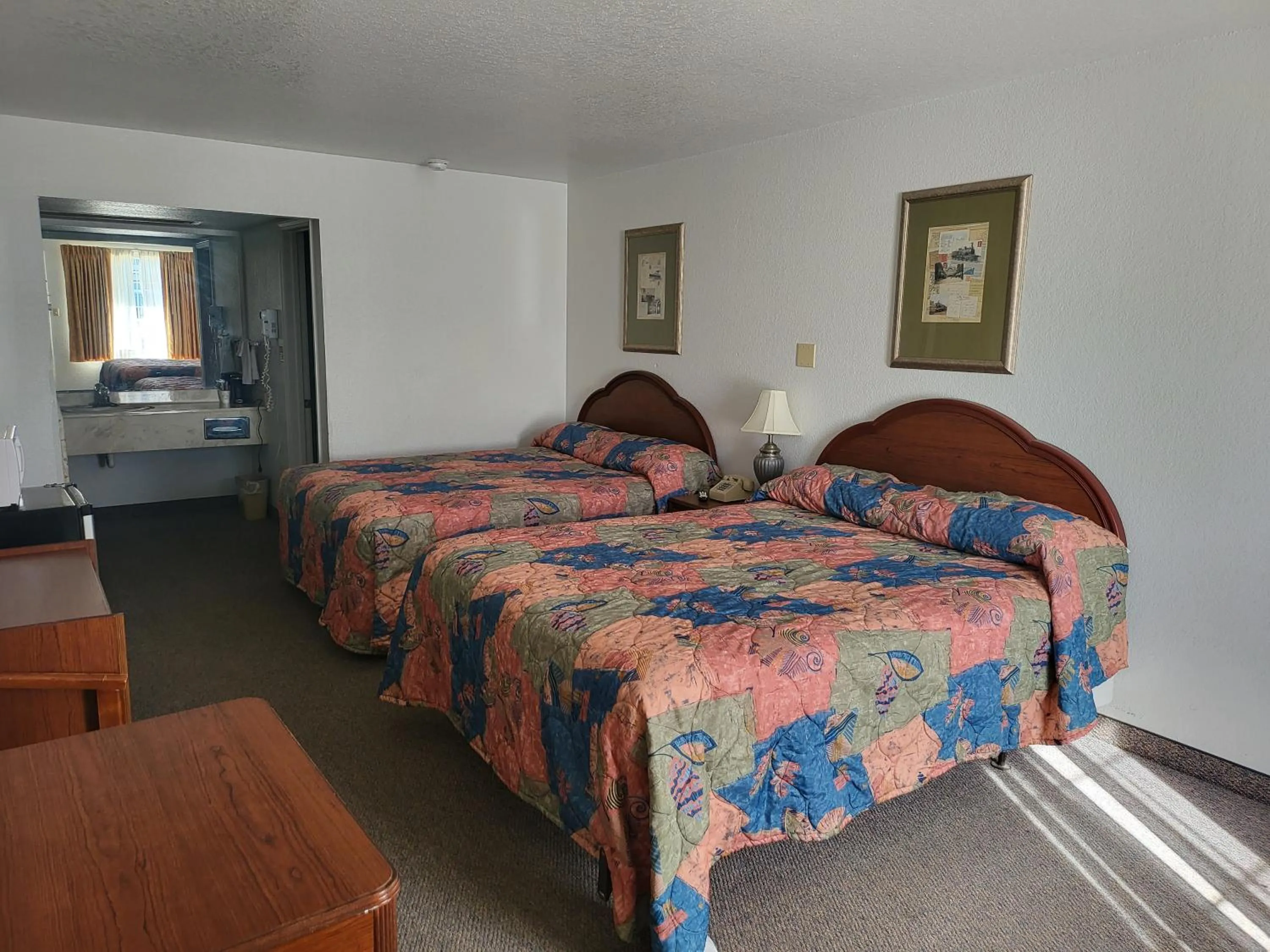 Bed in Blue Ribbon Inn and Suites