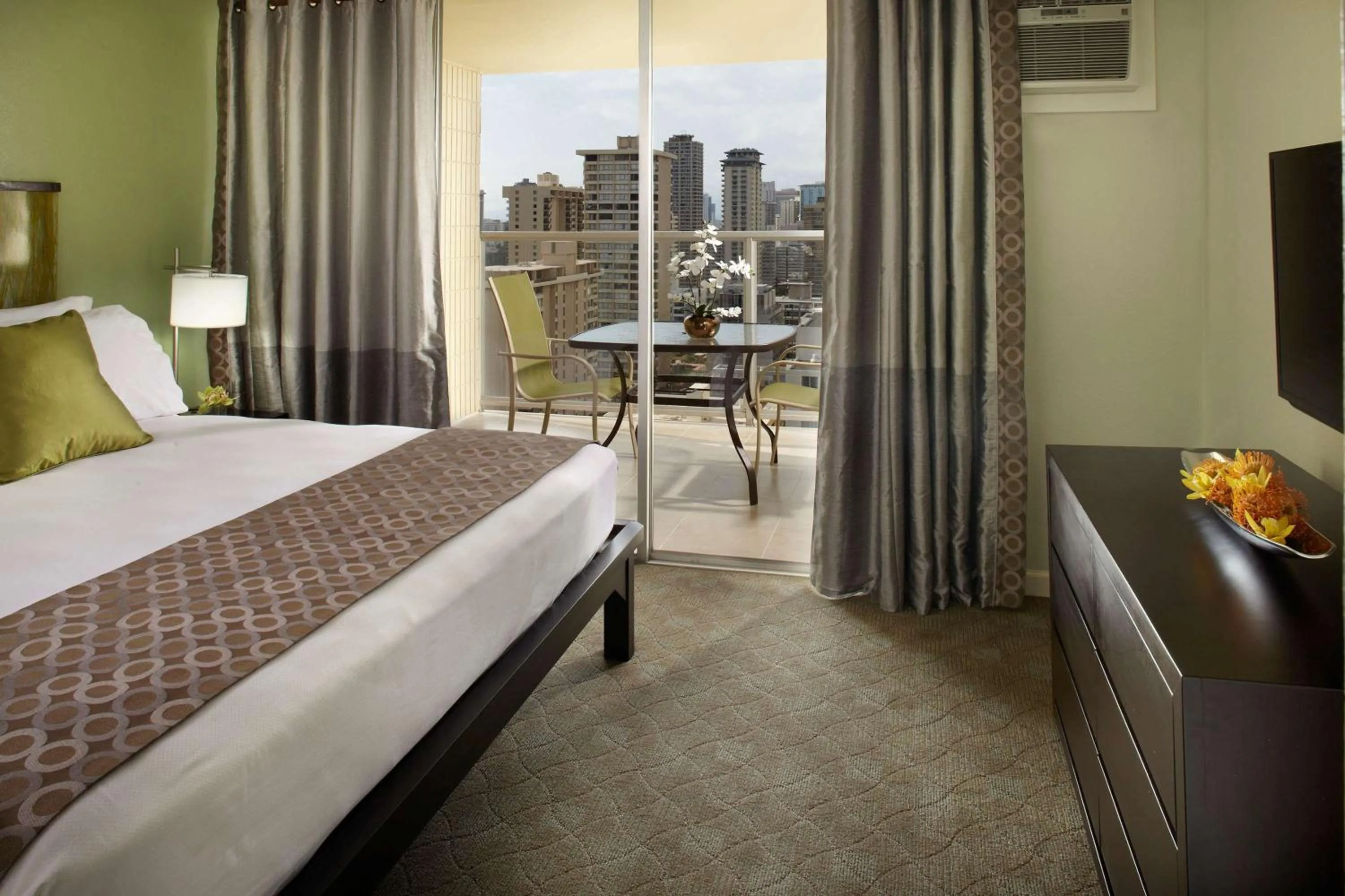 Bed in Skyline Island Colony Hotel