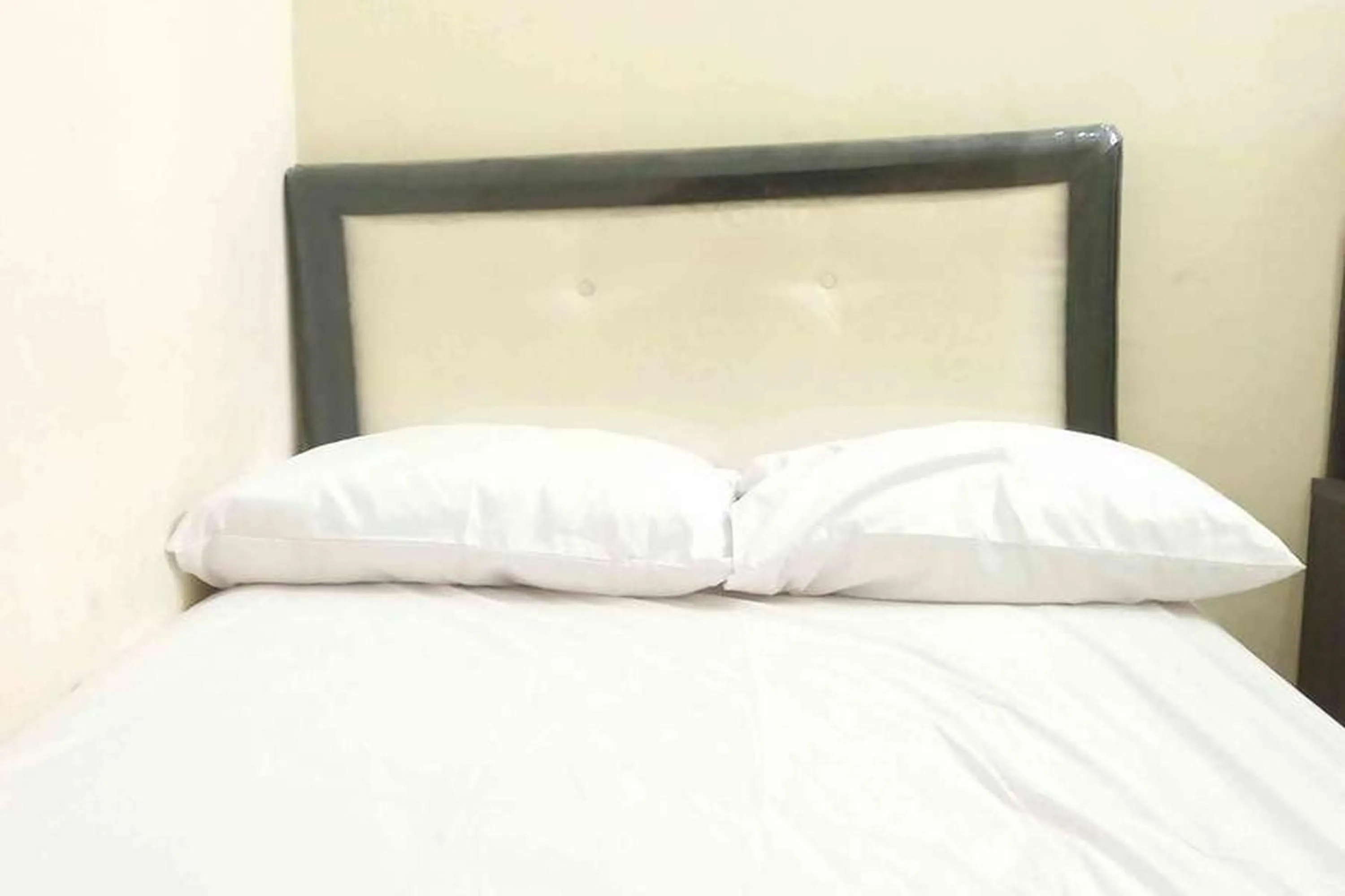 Bed in Omah Jaban Jogja Mitra RedDoorz