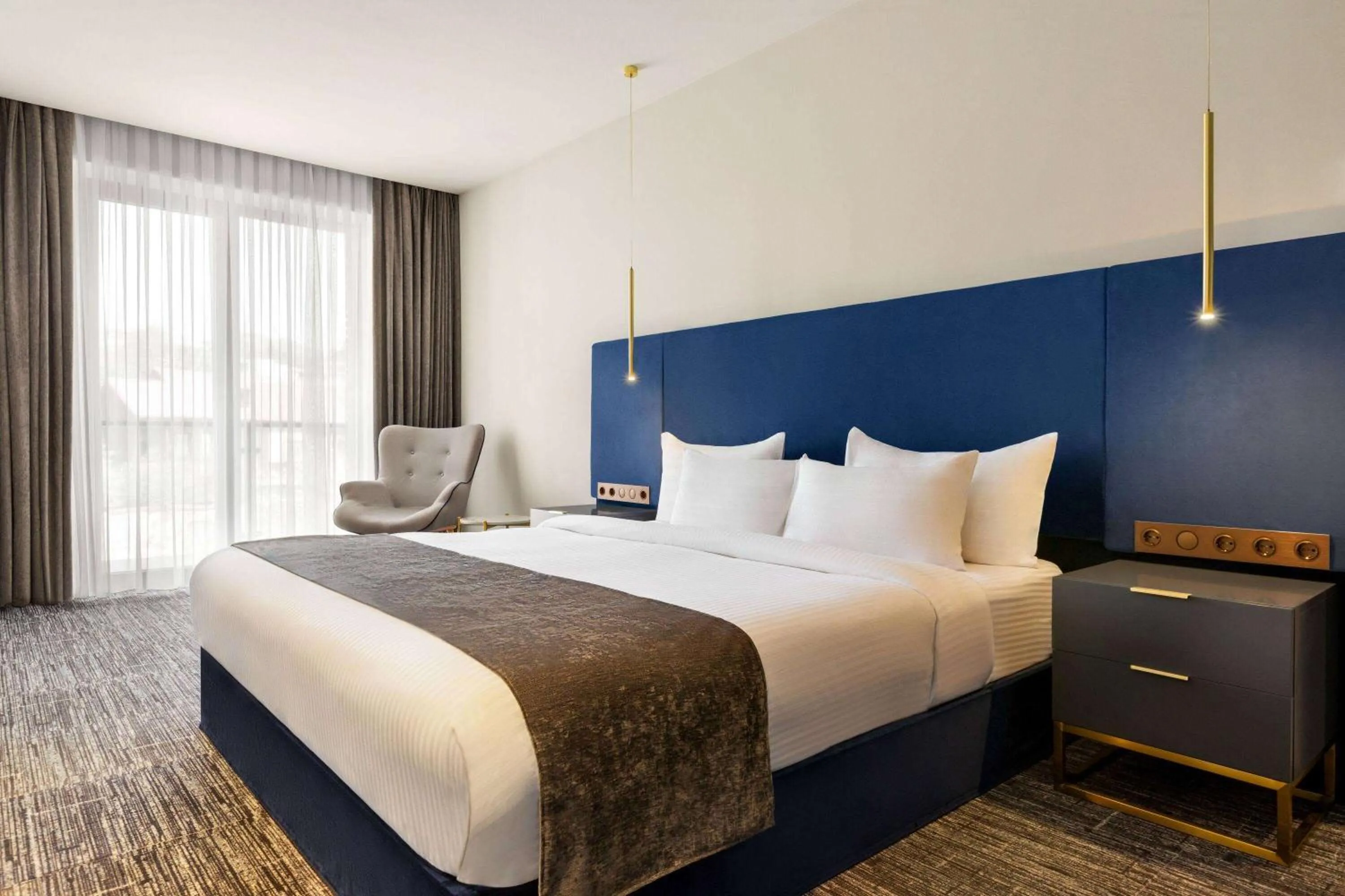 Photo of the whole room, Bed in Ramada by Wyndham Tbilisi Old City