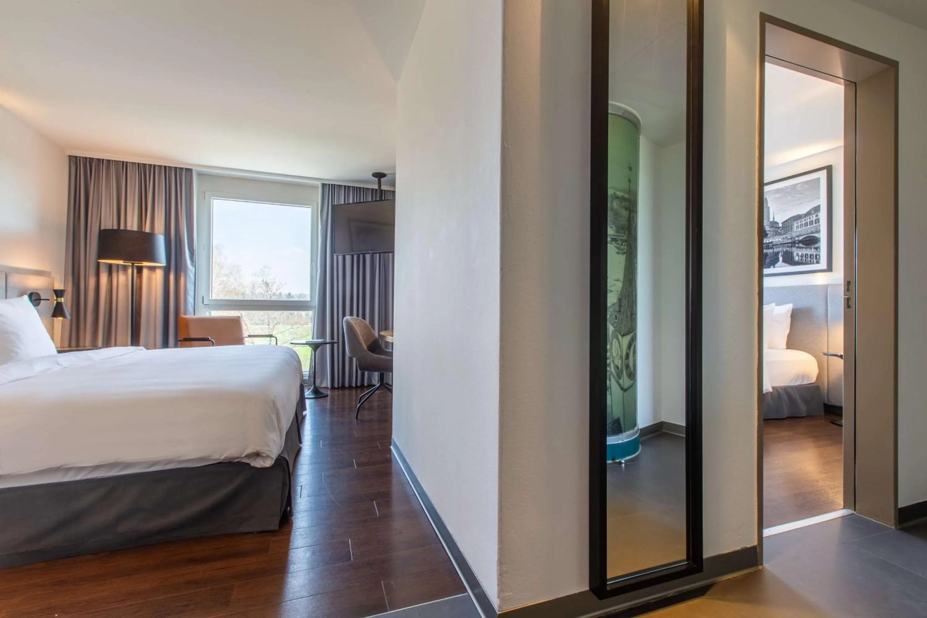 Photo of the whole room, Bed in Radisson Hotel Zurich Airport