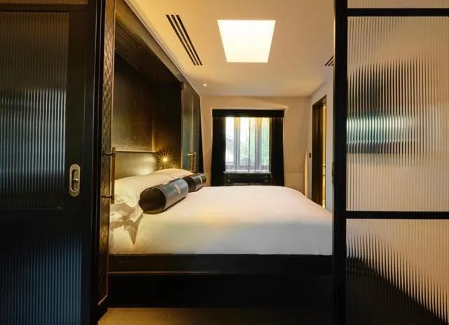 Bed in Chateau Denmark London