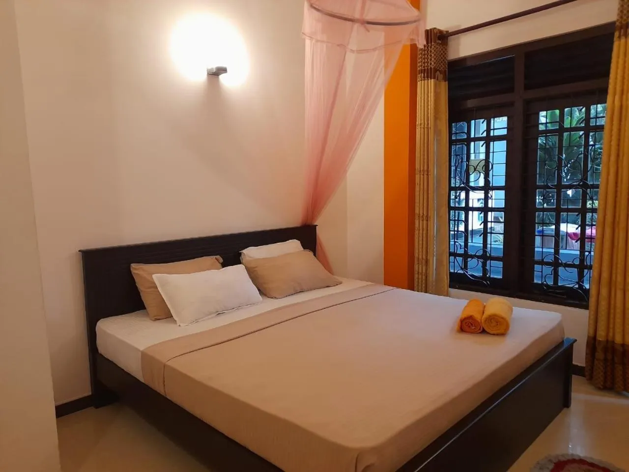 Bed in Kismet Rest Mirissa