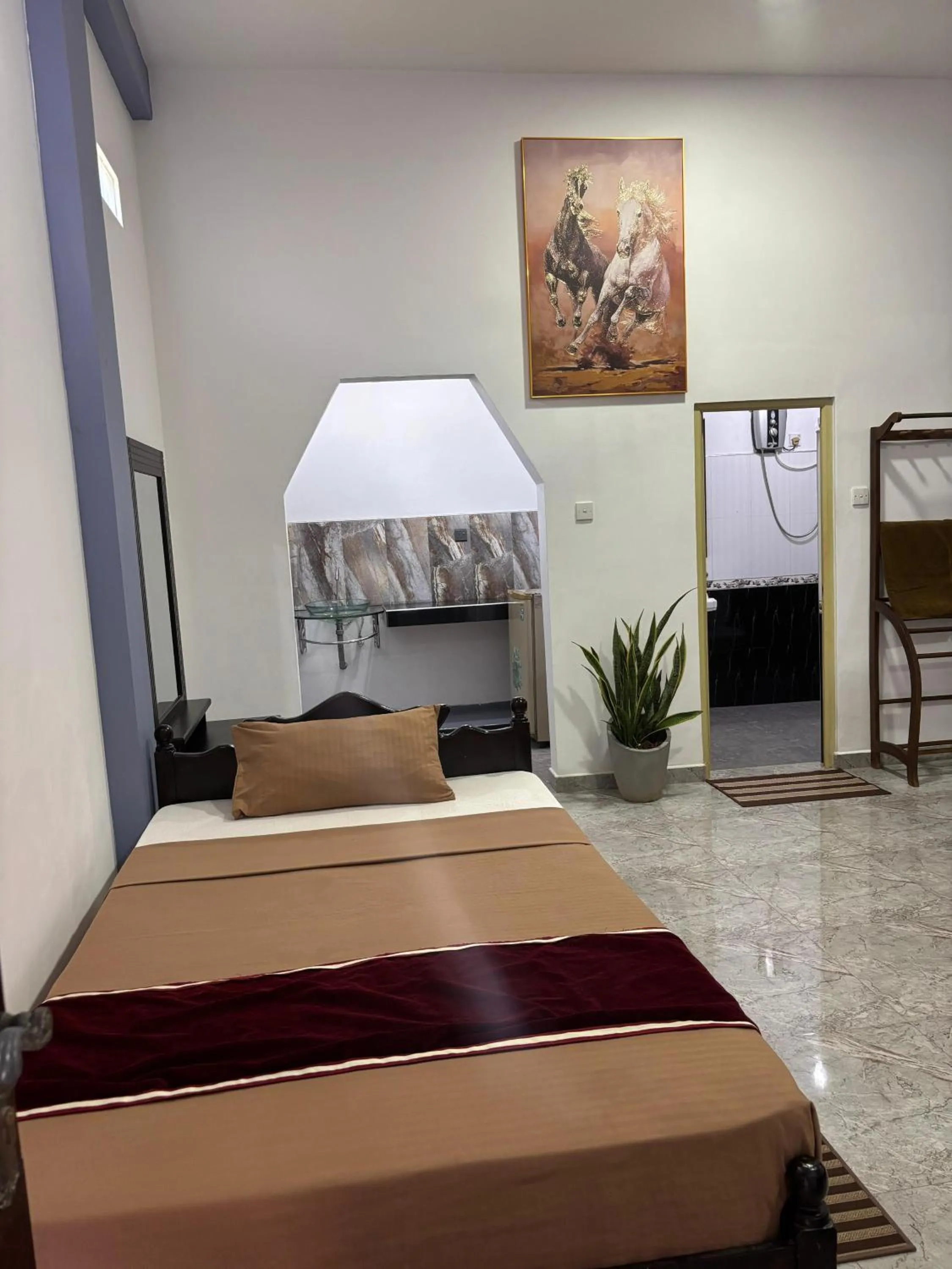 Bed in Kismet Rest Mirissa