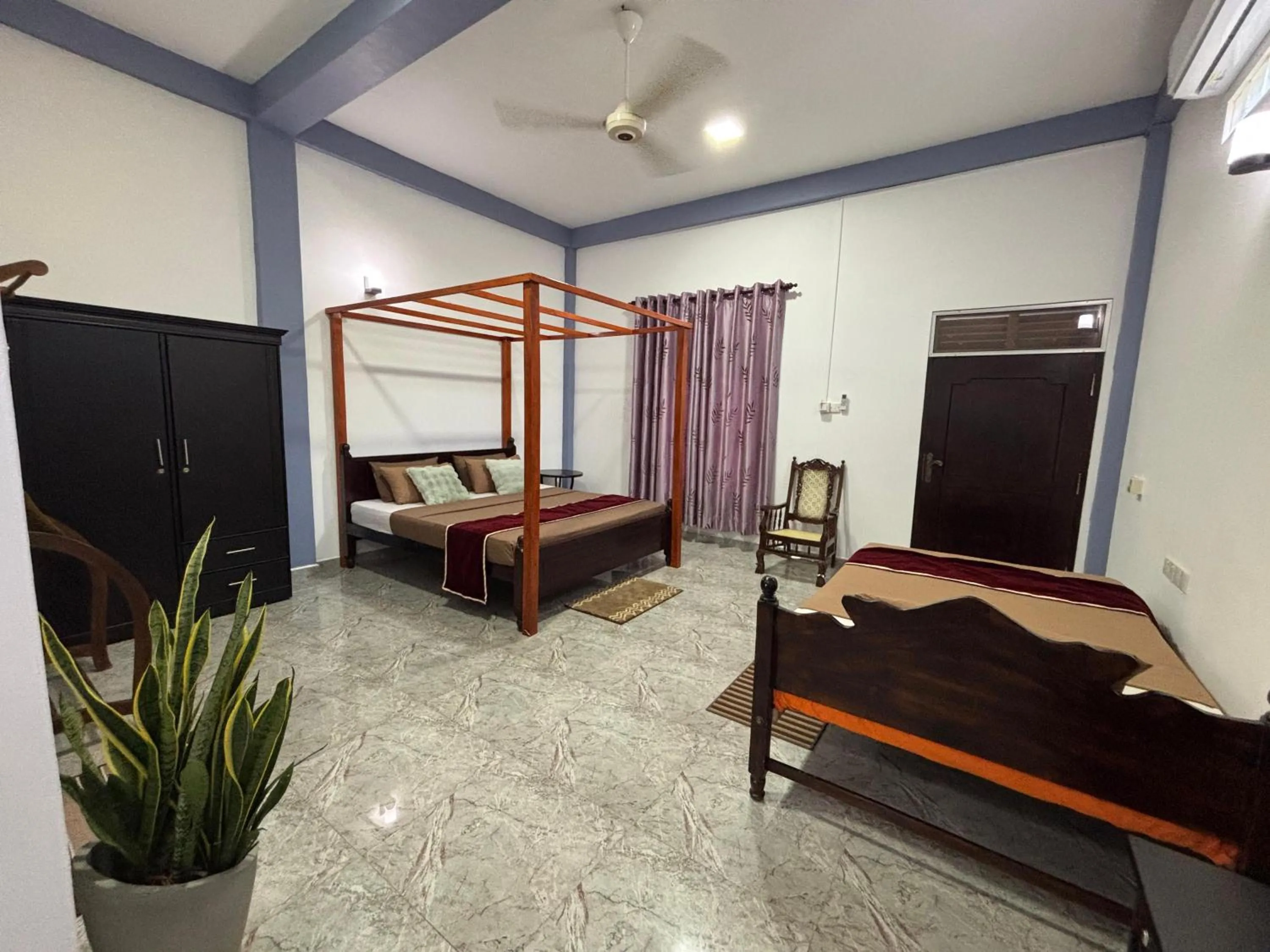 Bed in Kismet Rest Mirissa