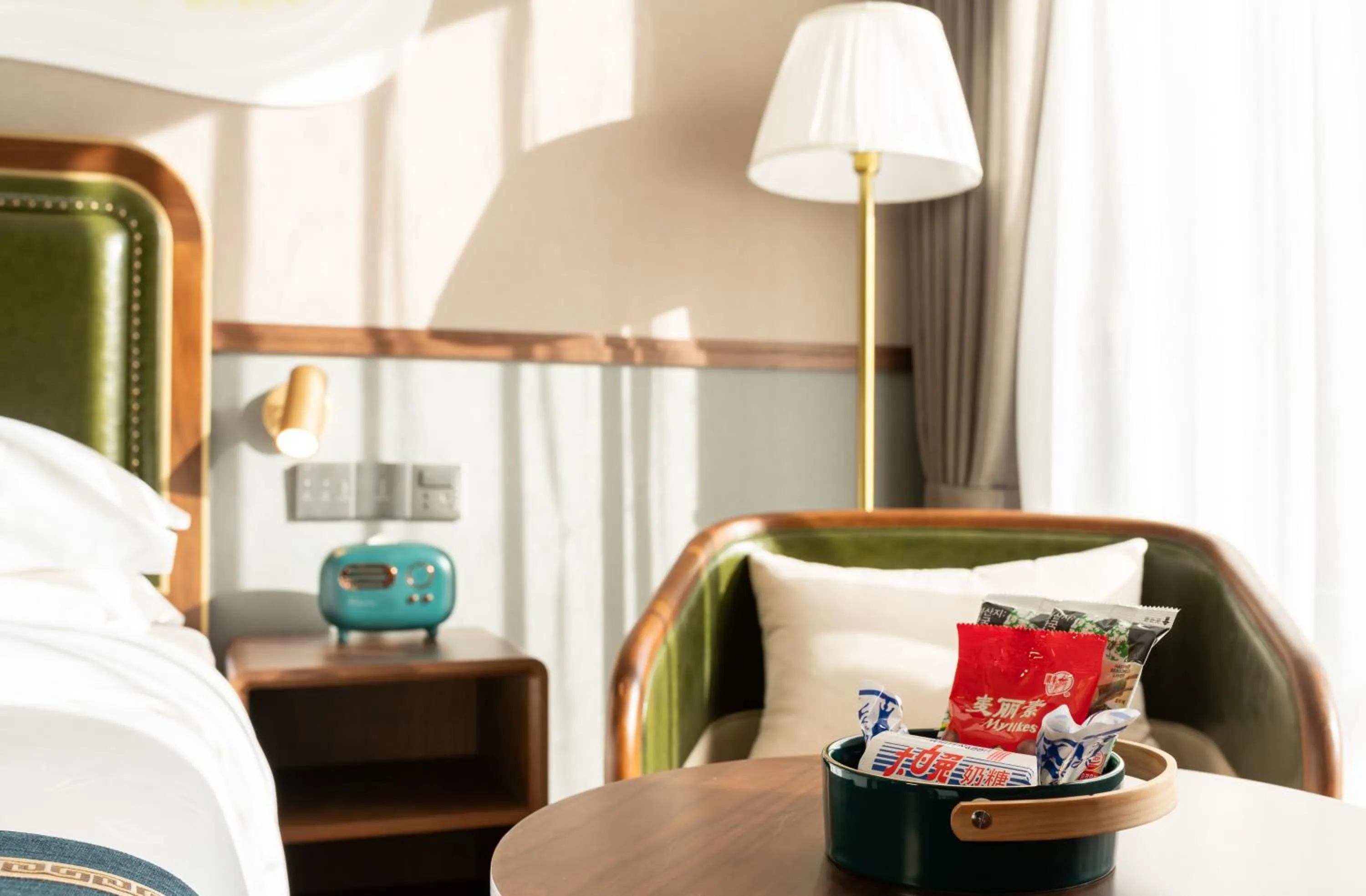 Seating area, Bed in Nost algia S Hotel Beijing Guomao CBD 时光漫步S酒店 北京大望路地铁站店 Free fresh ground coffee,Free laundry service