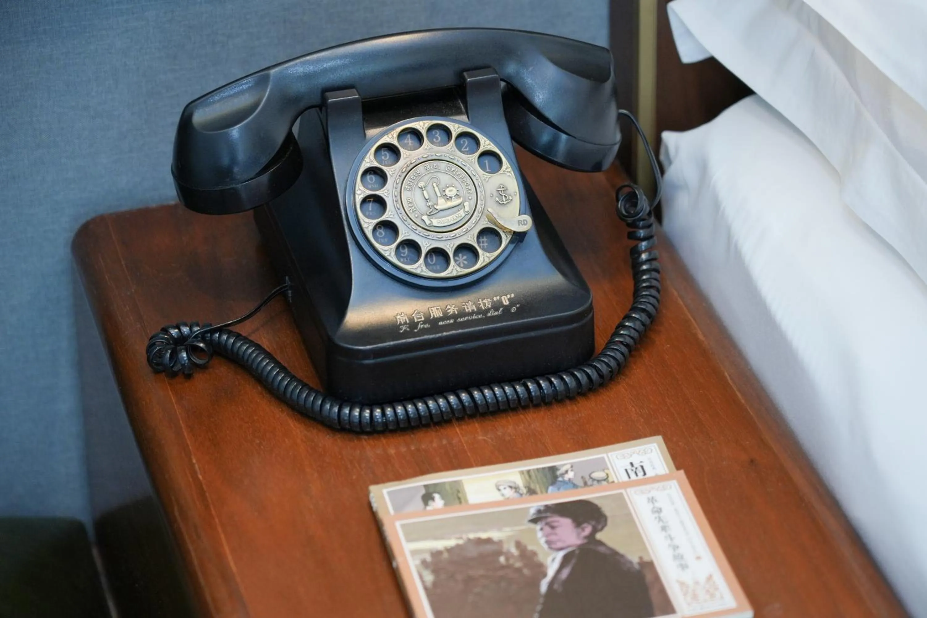 Text overlay in Nost algia S Hotel Beijing Guomao CBD 时光漫步S酒店 北京大望路地铁站店 Free fresh ground coffee,Free laundry service