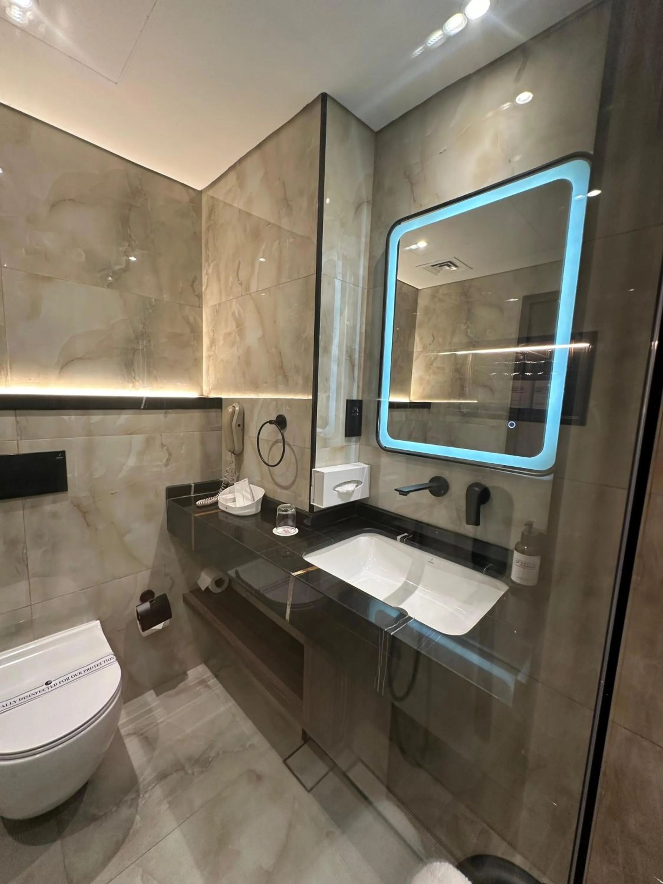 Bathroom in Dubai Grand Hotel by Fortune, Dubai Airport
