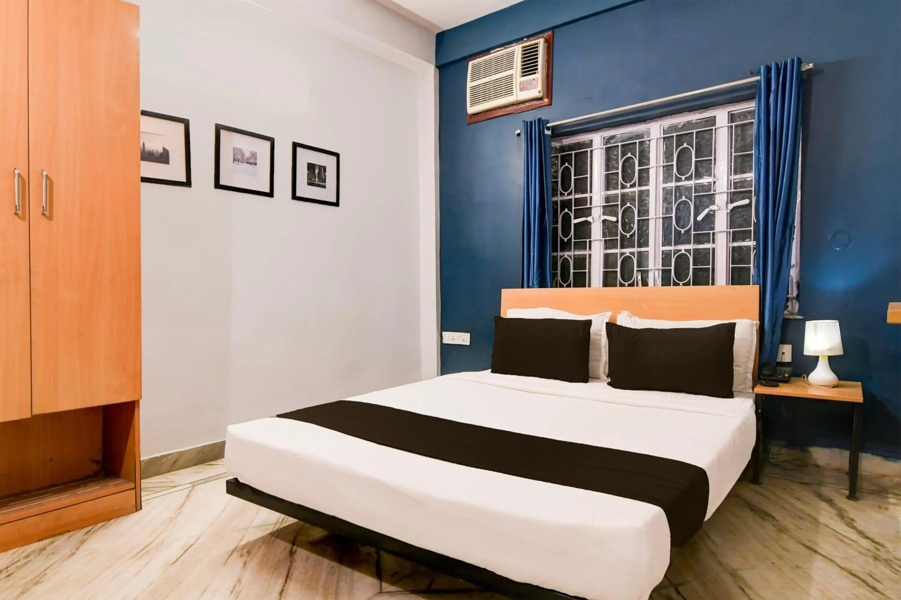 Bedroom, Bed in Super Hotel O Picnic Garden formerly Amaris Stay