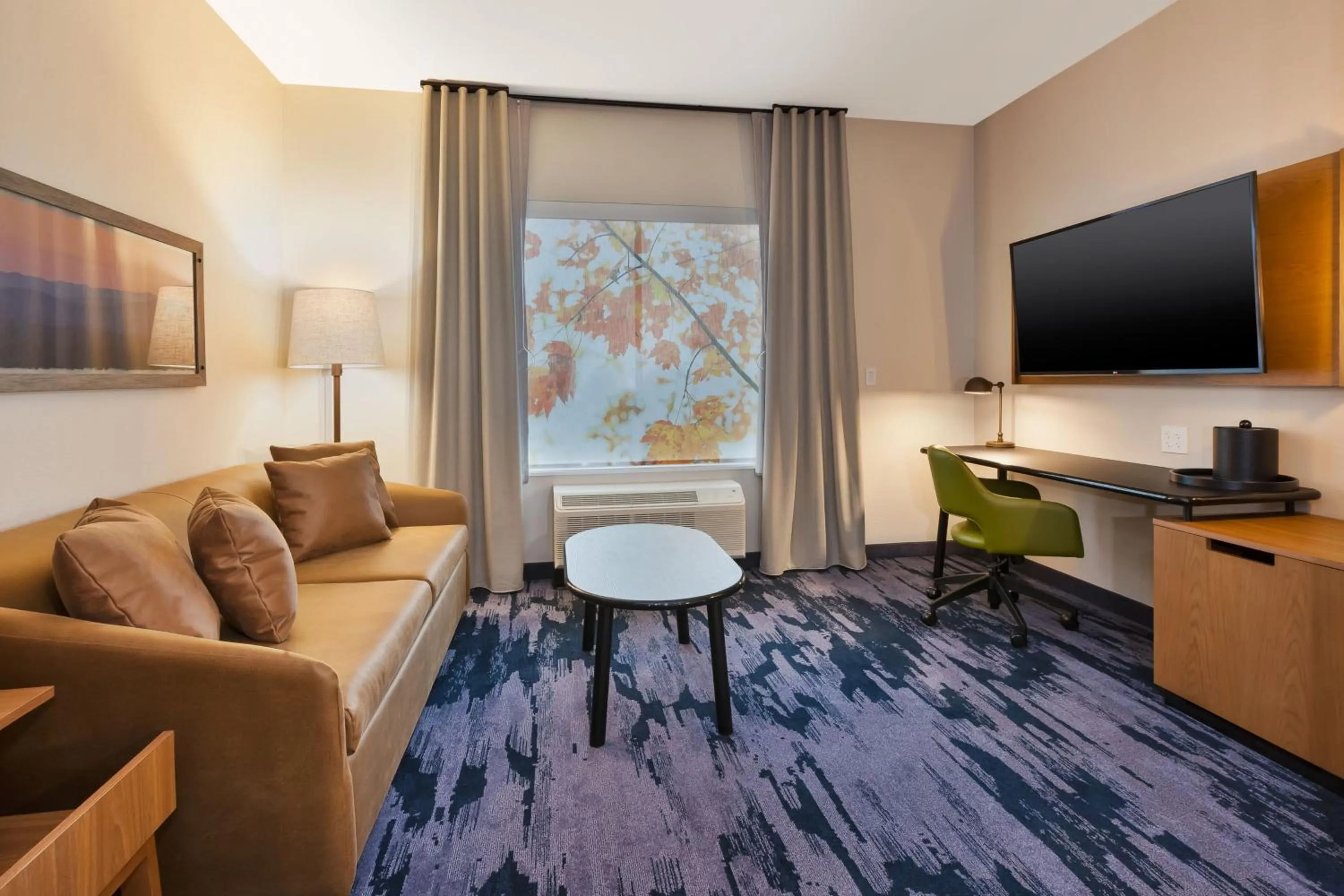 Living room in Fairfield by Marriott Inn & Suites Grand Rapids North