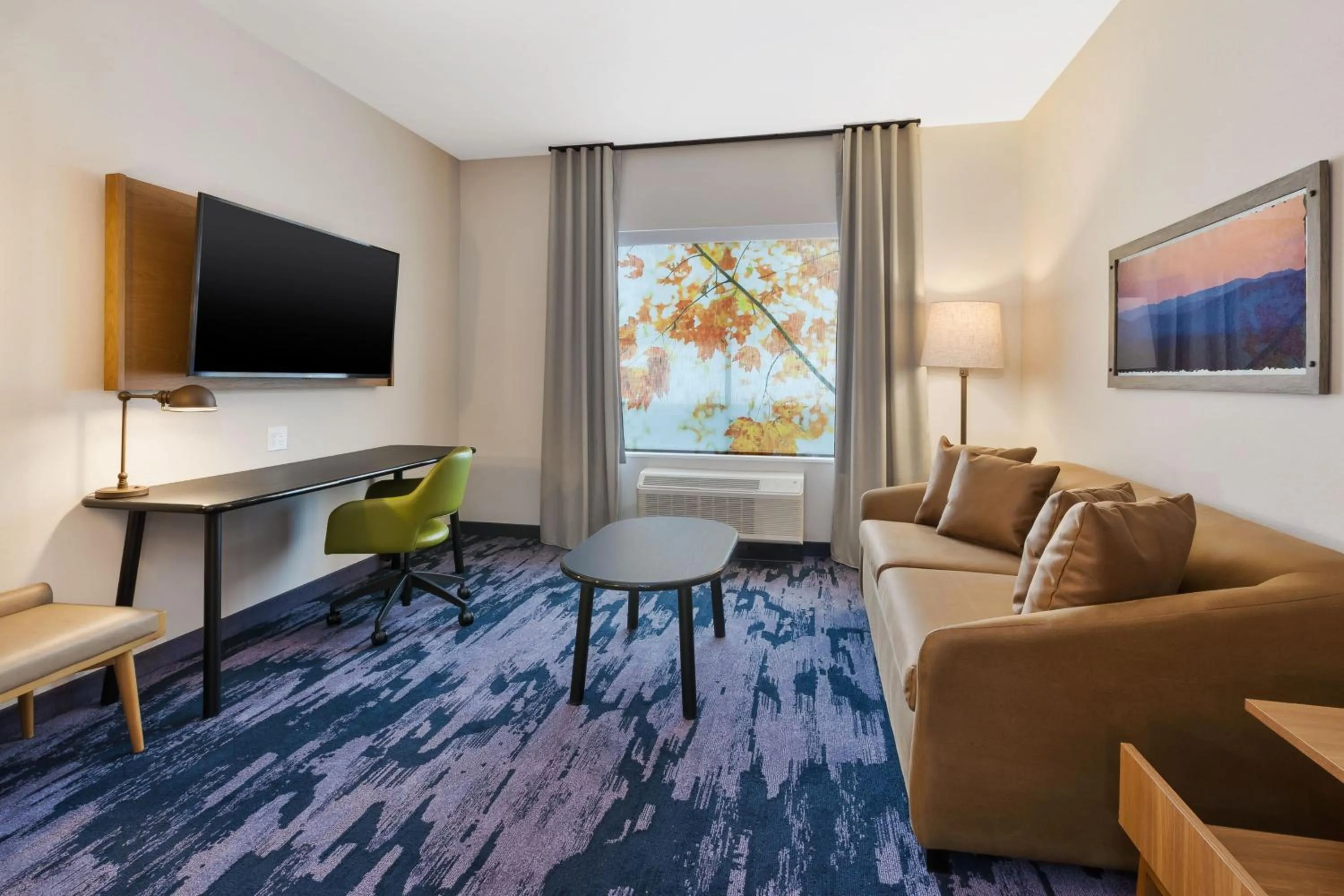 Living room in Fairfield by Marriott Inn & Suites Grand Rapids North