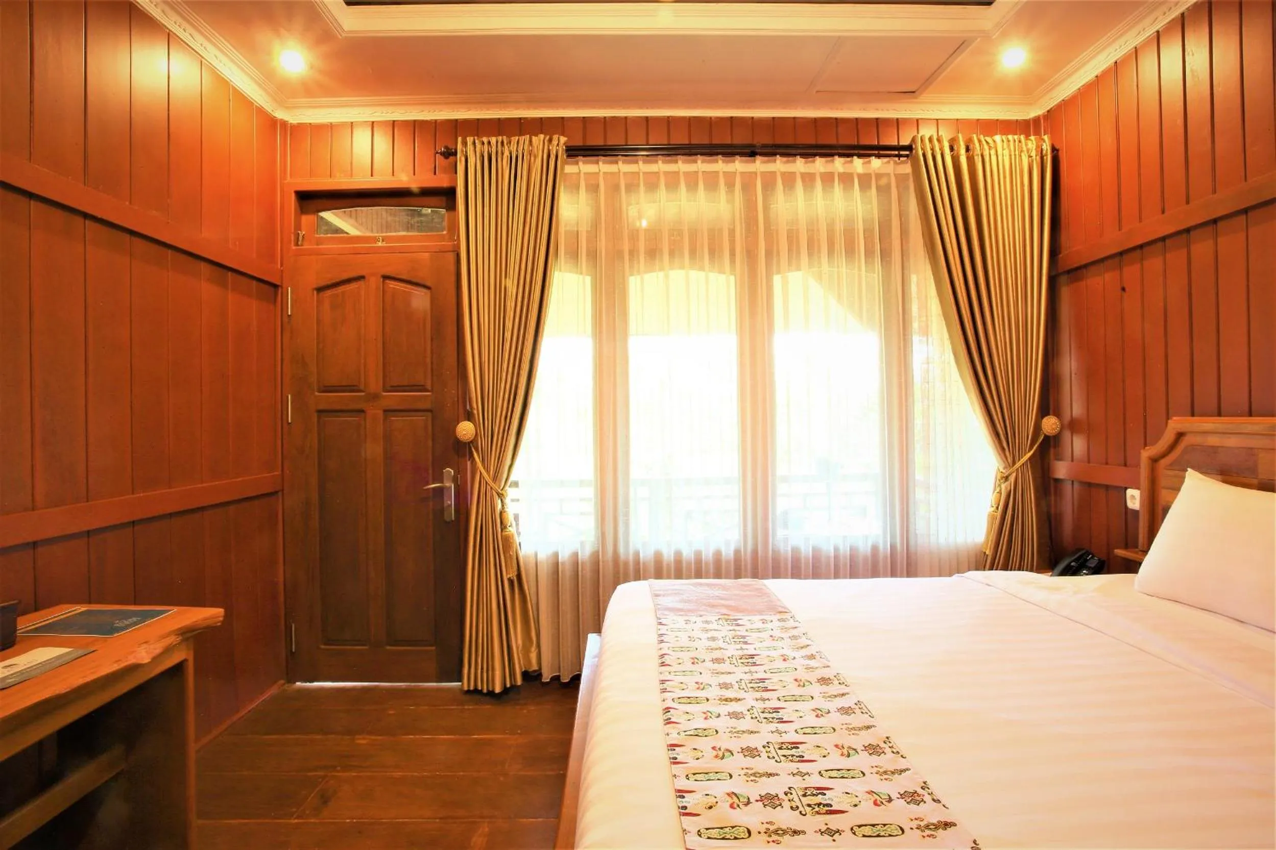 Bed in Kasuari Exotic Resort Magelang