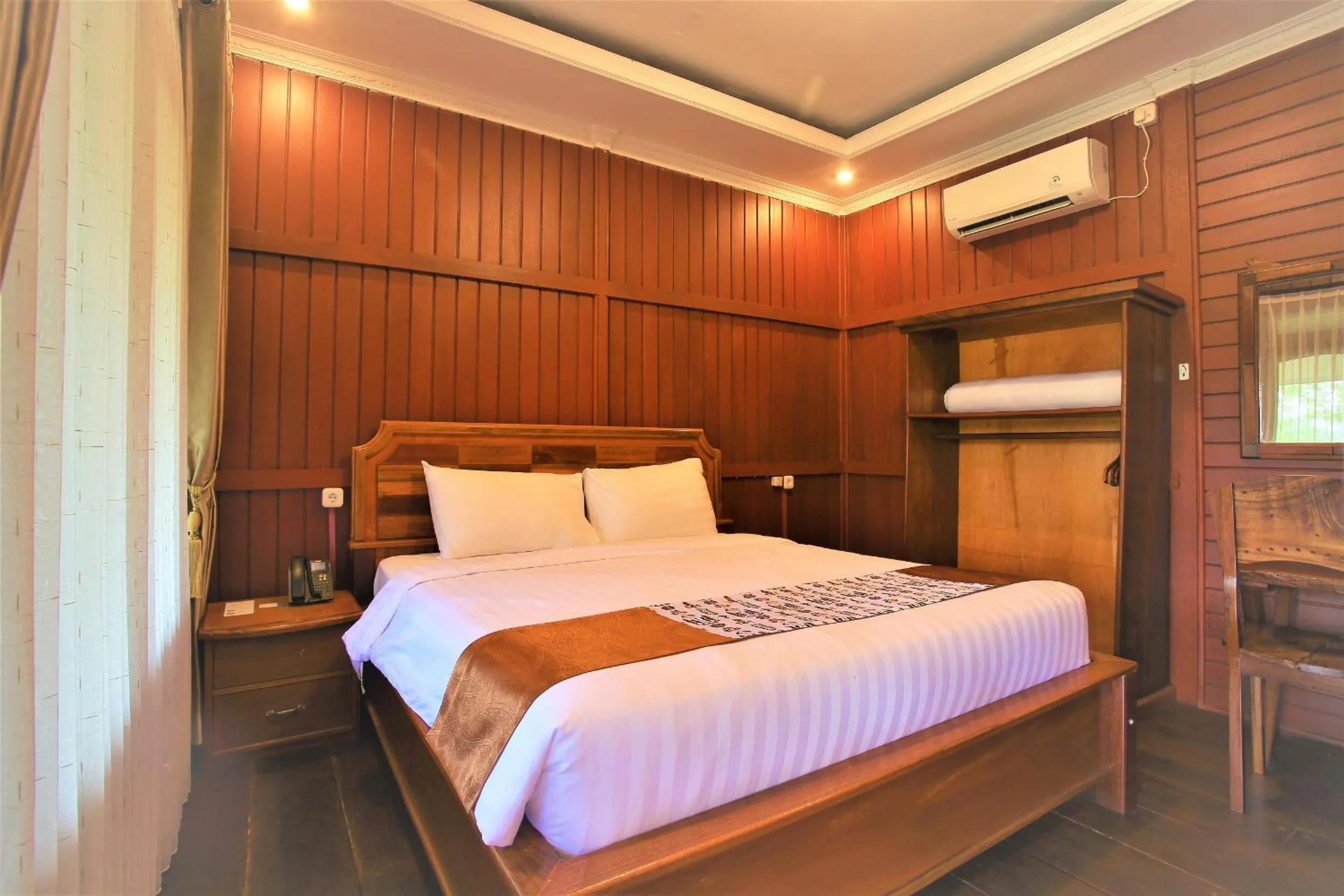 Bed in Kasuari Exotic Resort Magelang