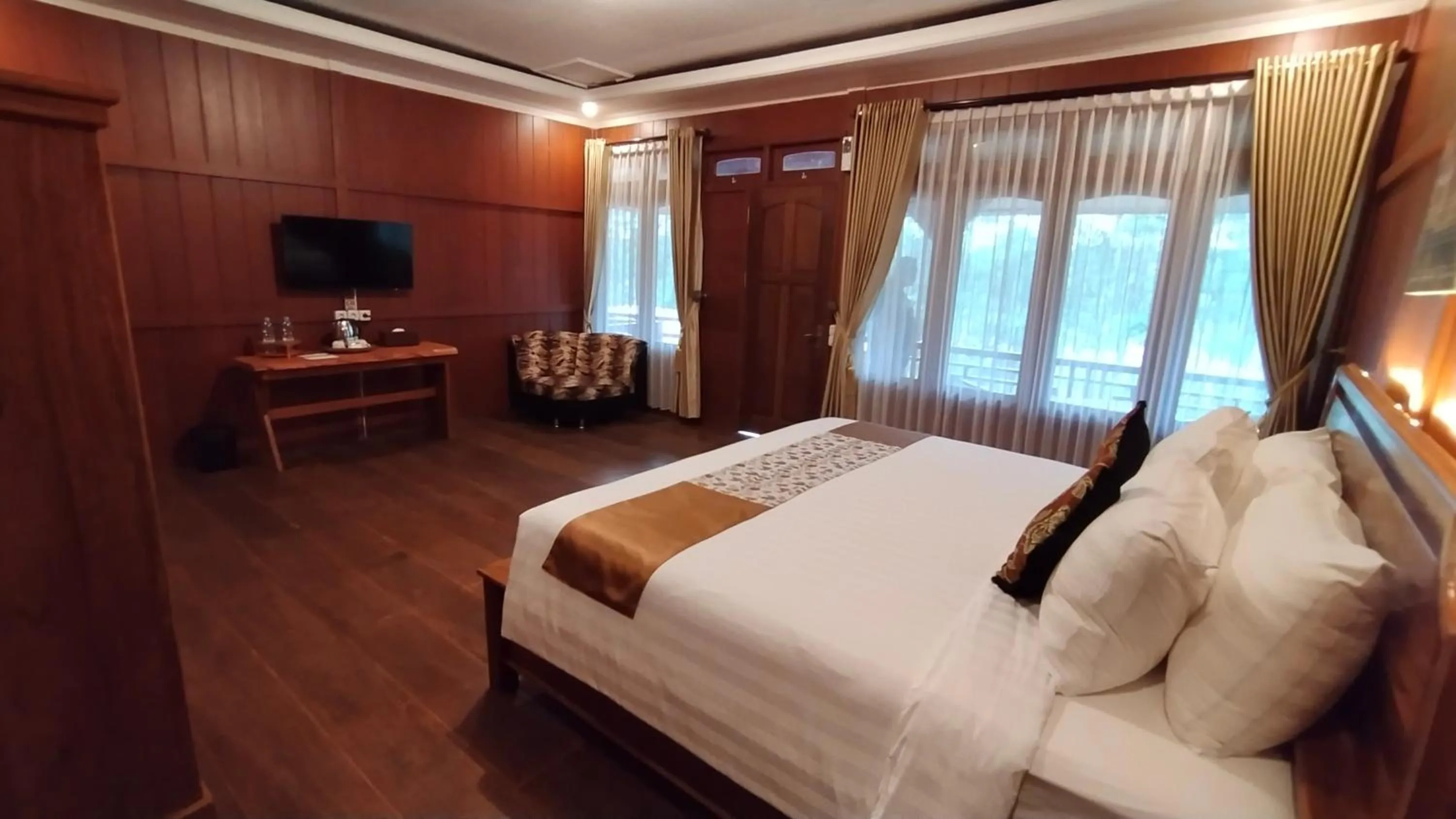 Bed in Kasuari Exotic Resort Magelang