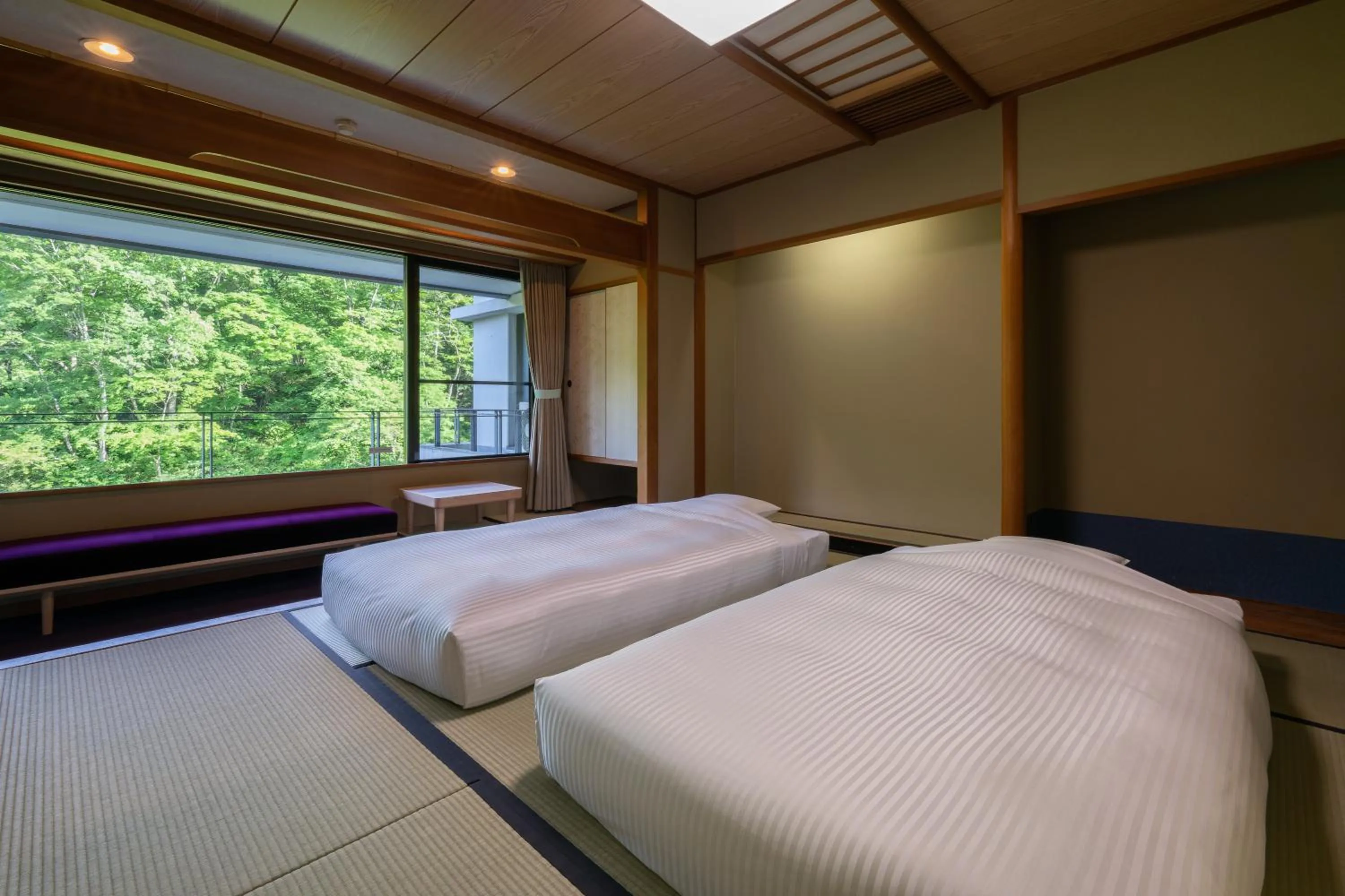 Photo of the whole room, Bed in KAMENOI HOTEL Nikko Yunishigawa All-Inclusive Resort