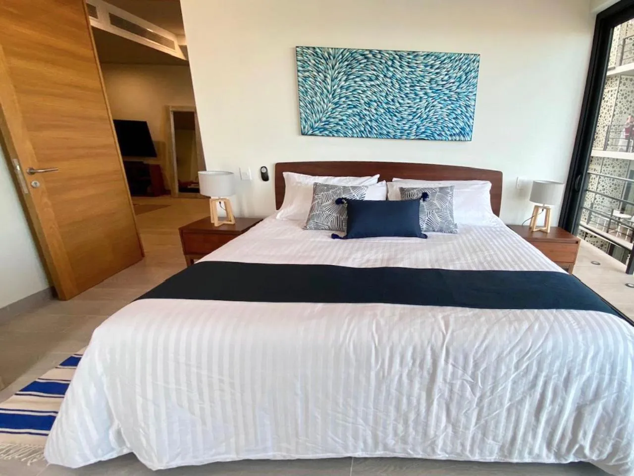 Bed in The Boat Condo by Andiani Travel