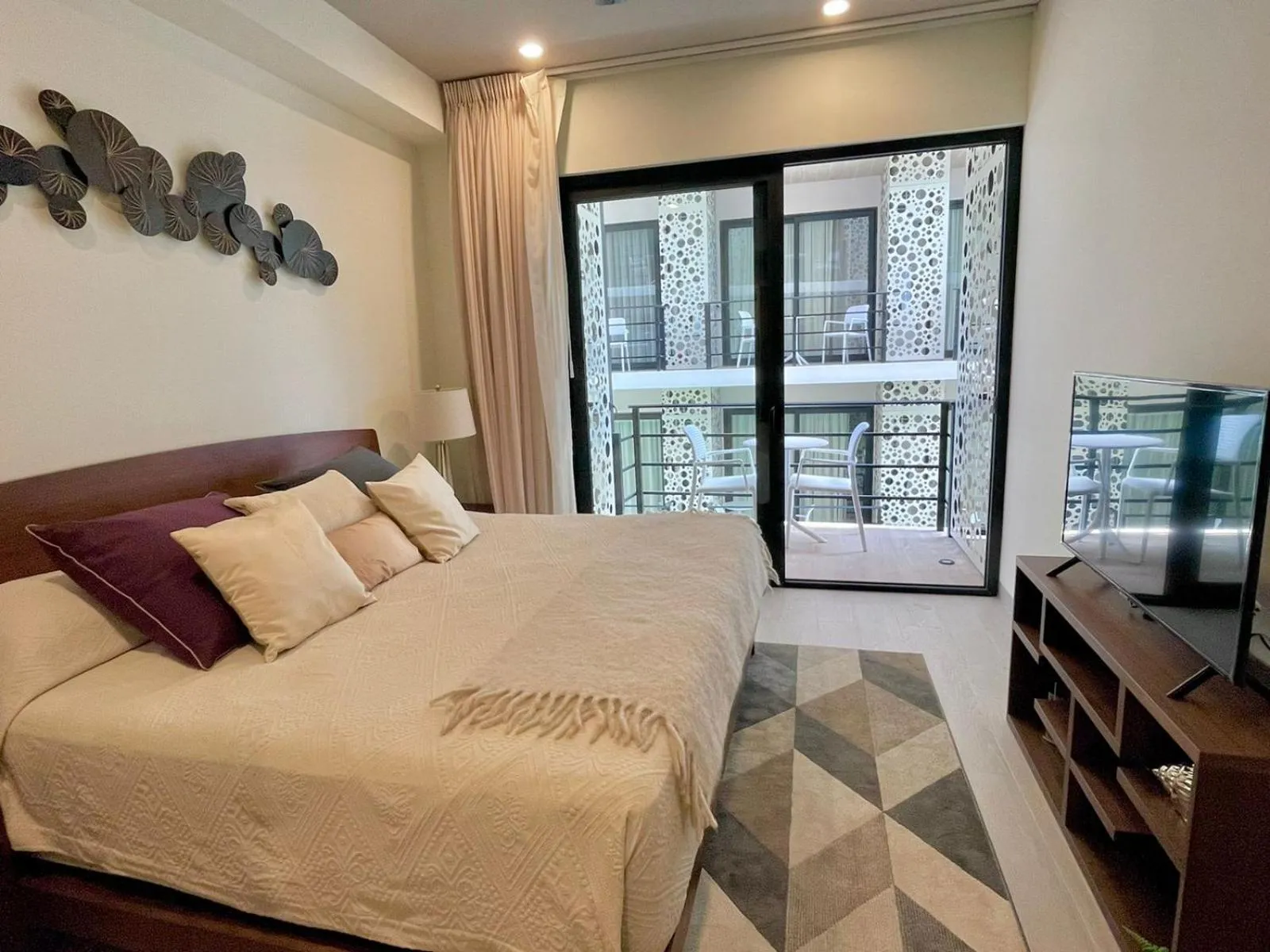 Bed in The Boat Condo by Andiani Travel