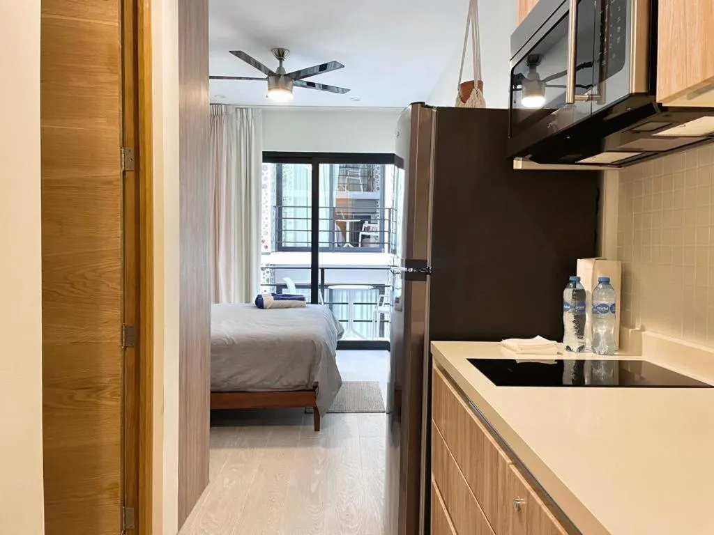 Bed in The Boat Condo by Andiani Travel