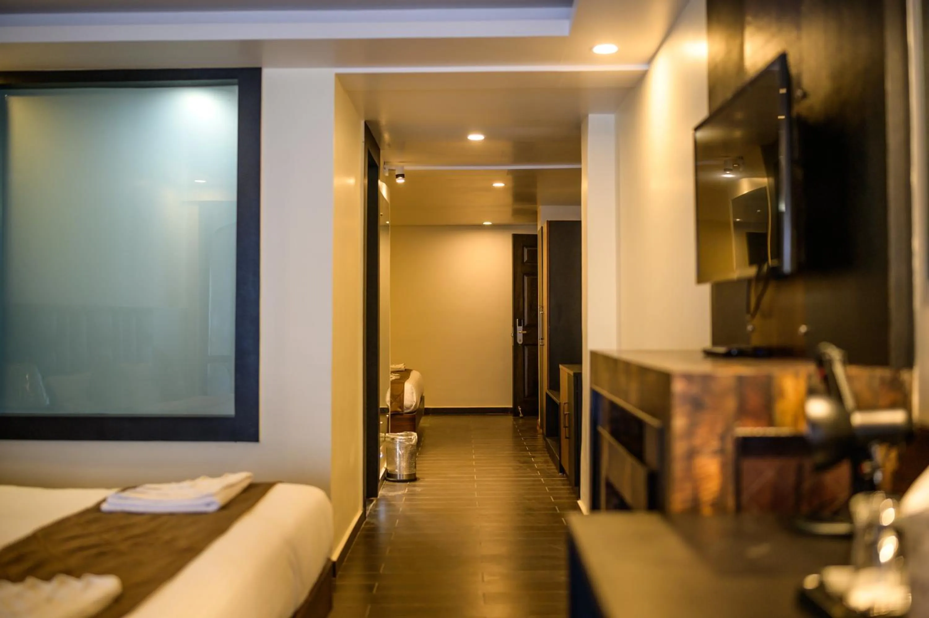 Communal lounge/ TV room, Bed in Istana Resort & Spa