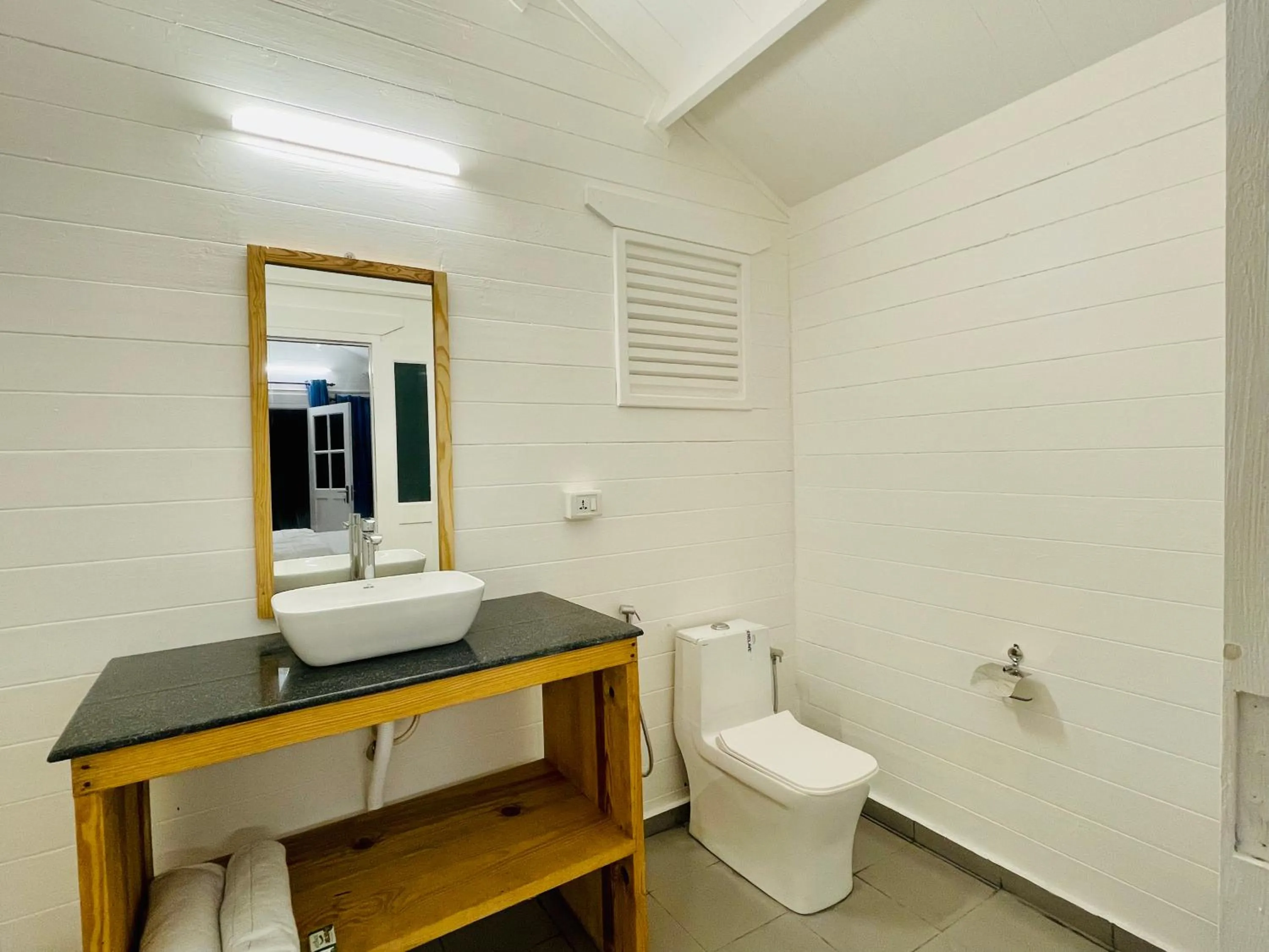 Toilet in Cocos Beach Resort