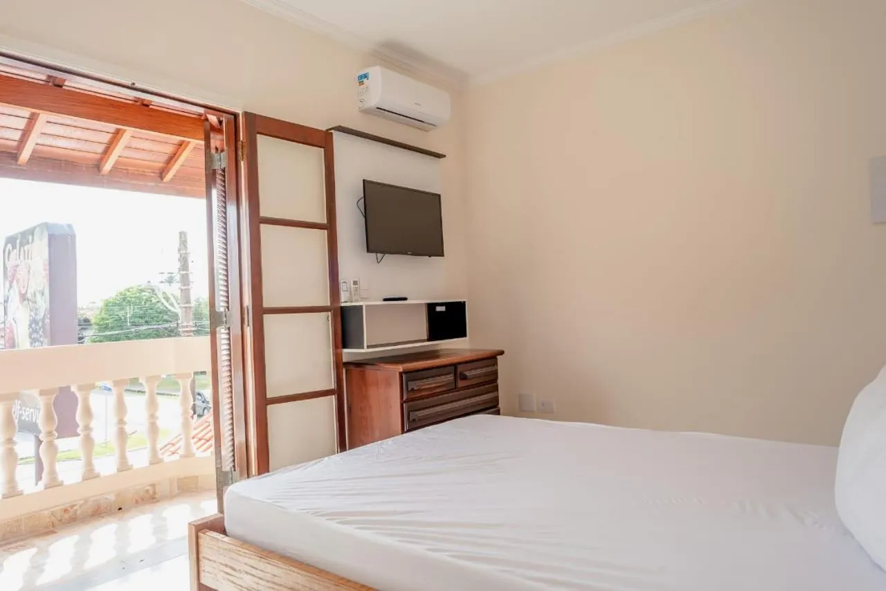 Bed in Pousada Oásis