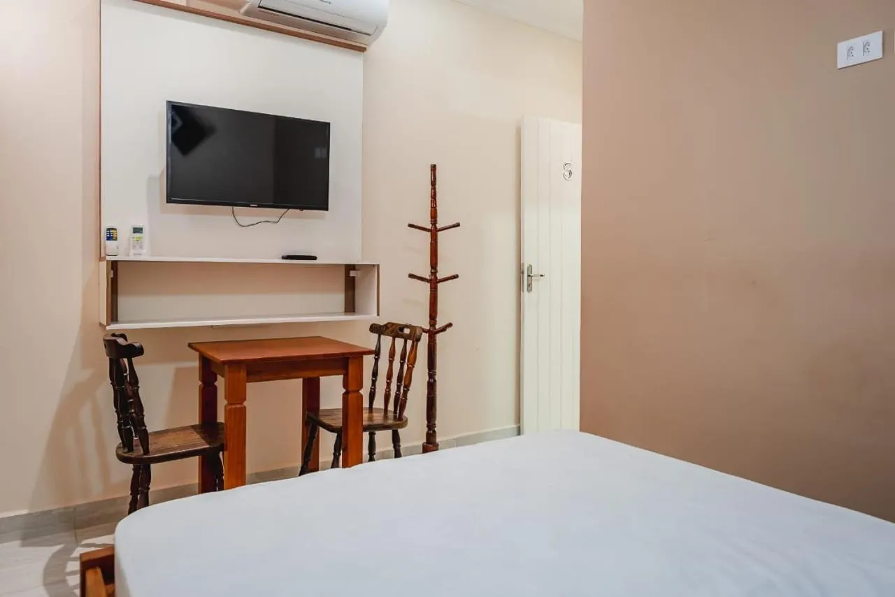 Bed in Pousada Oásis