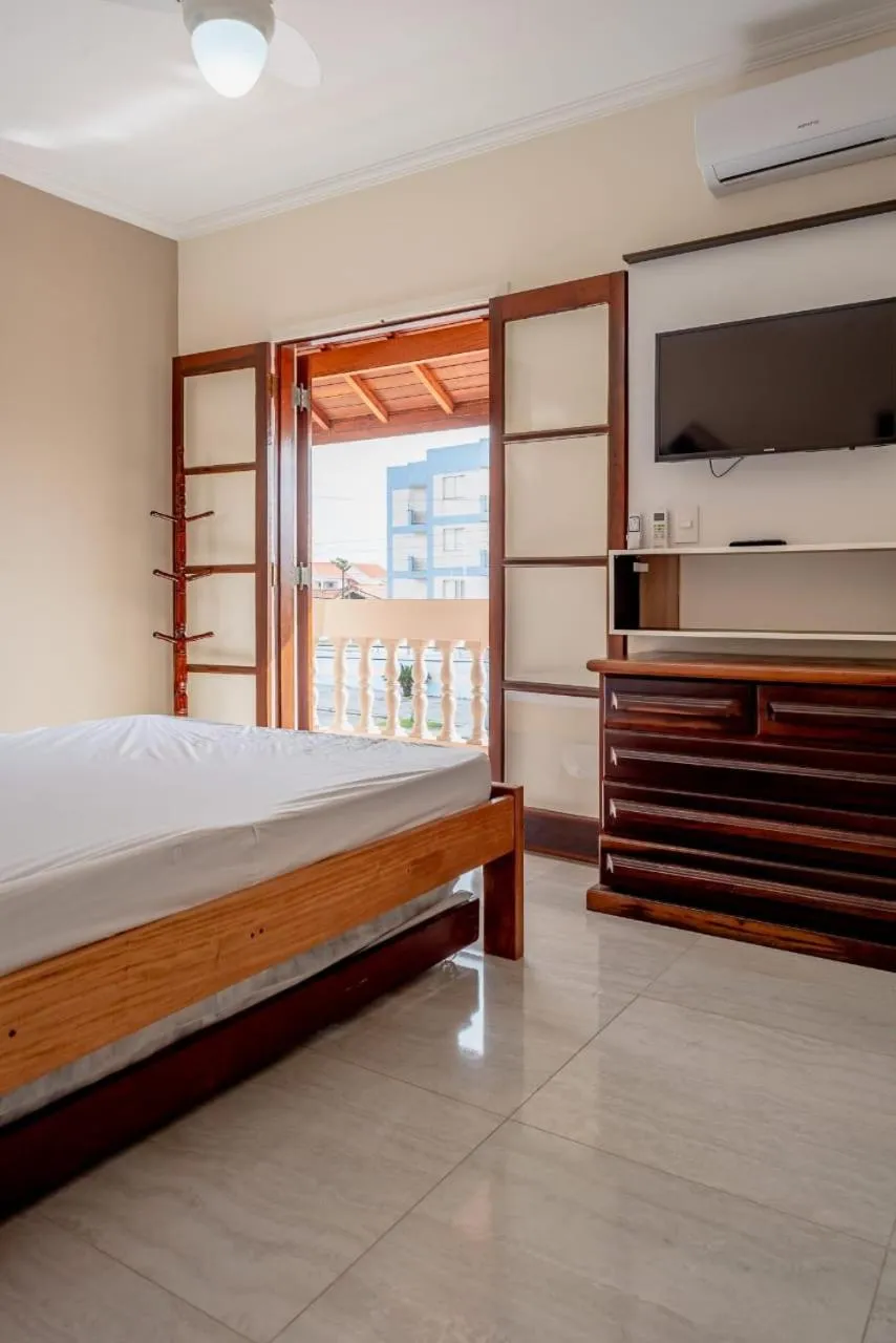 Bed in Pousada Oásis