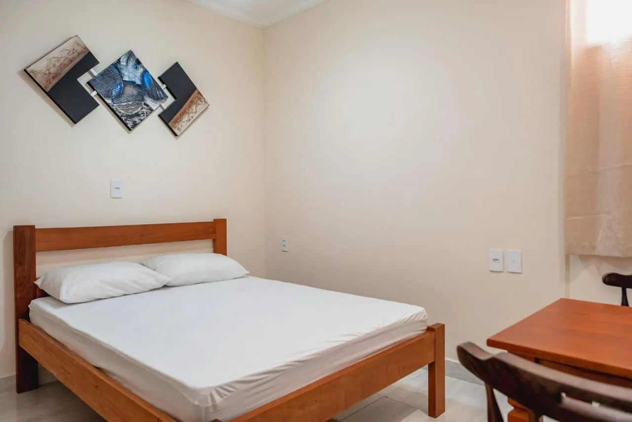 Bed in Pousada Oásis